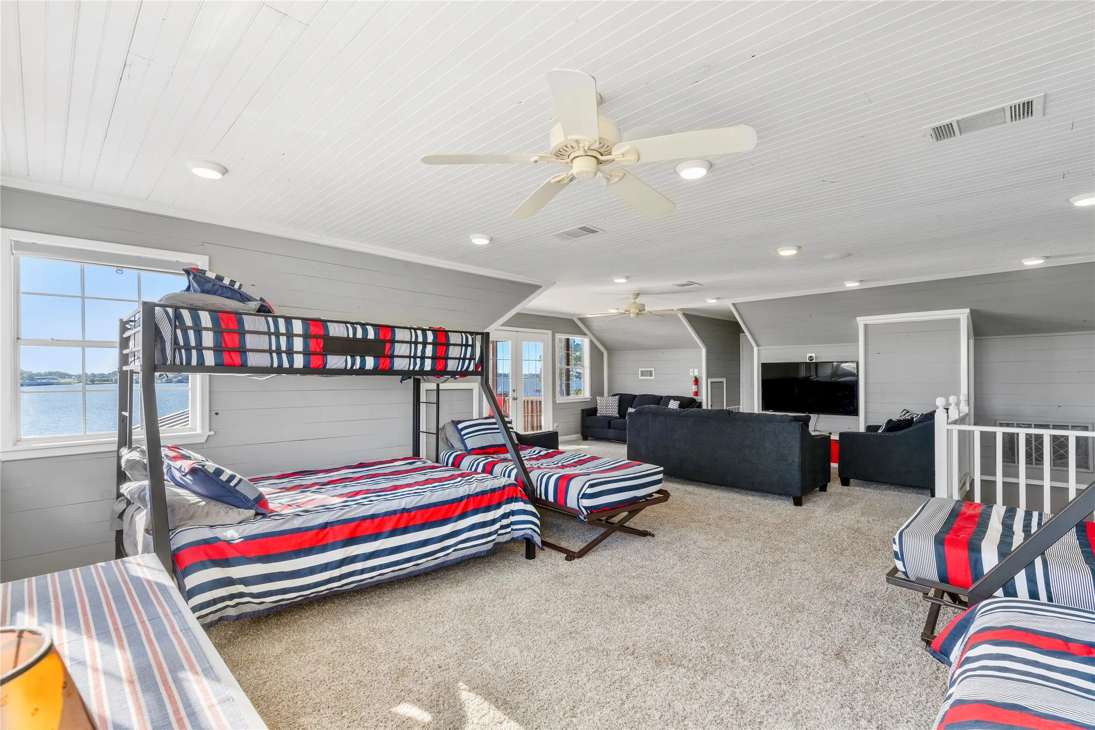 Flex space with total of two queen beds, three queen pull out sofas, two twin beds plus various pull outs.