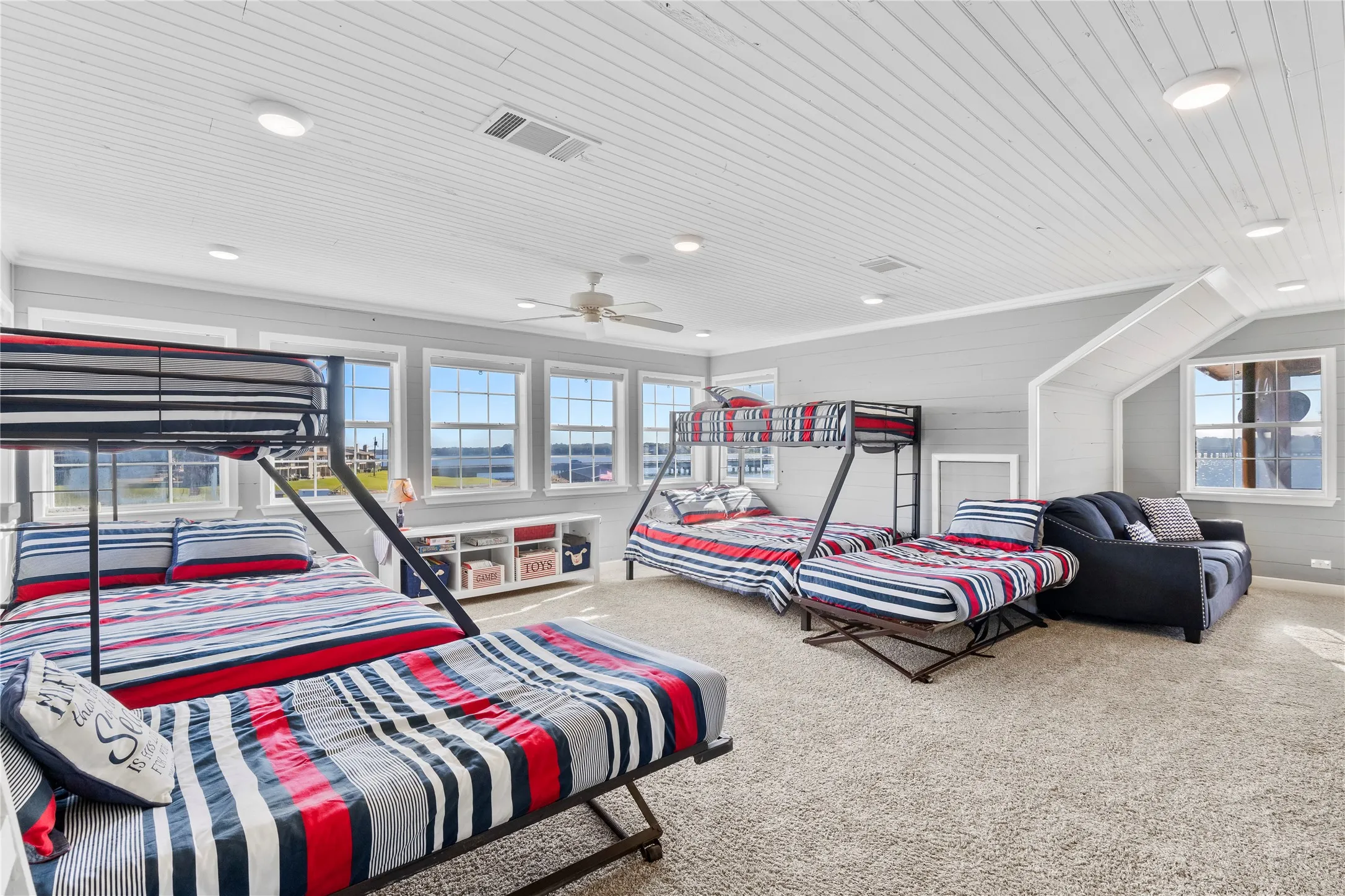 Flex space with total of two queen beds, three queen pull out sofas, two twin beds plus various pull outs.