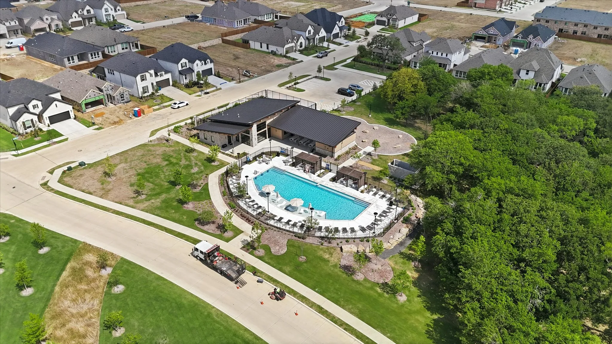 Two community pools! both with outdoor seating, pergolas, playground and more.
