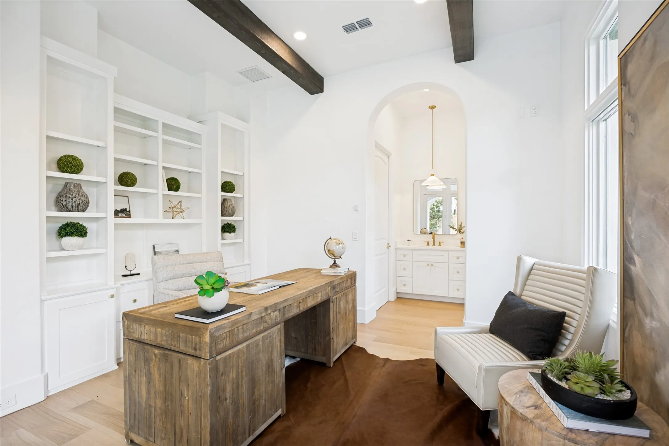 The office could be a living area for the guest bedroom with a "jack and jill" bath creating a complete in-law suite