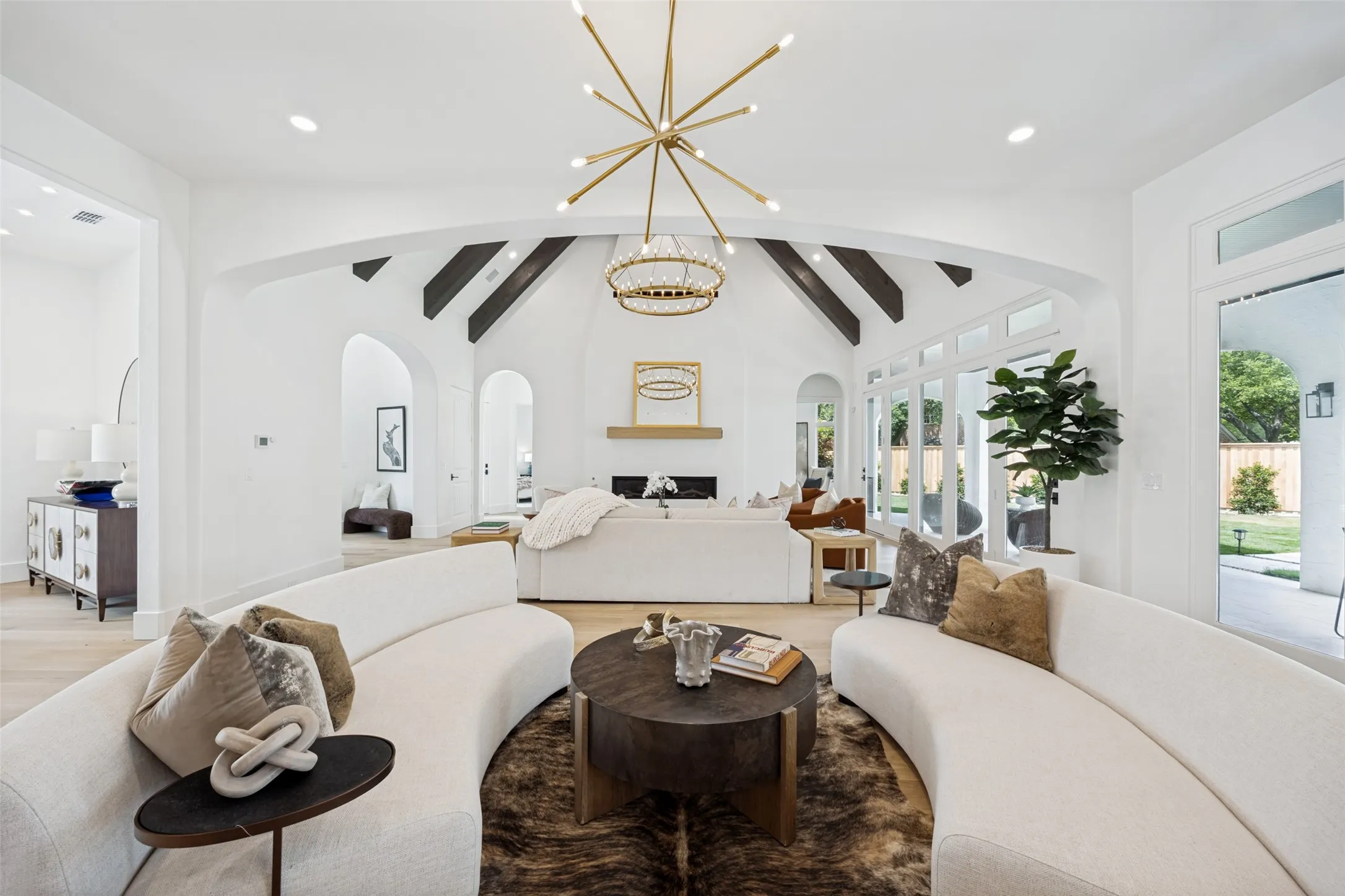 The great room viewed from the  kitchen area. Dining room is on the left.