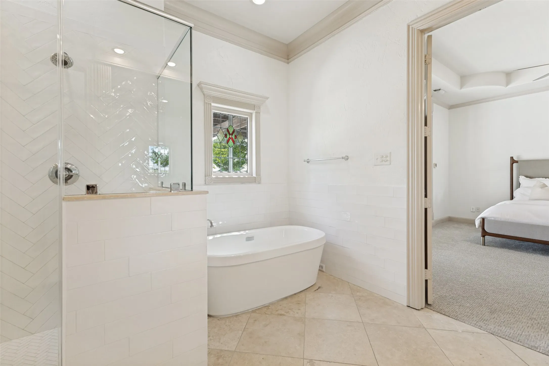 Luxurious master bath with a gorgeous shower area and huge walk in closet