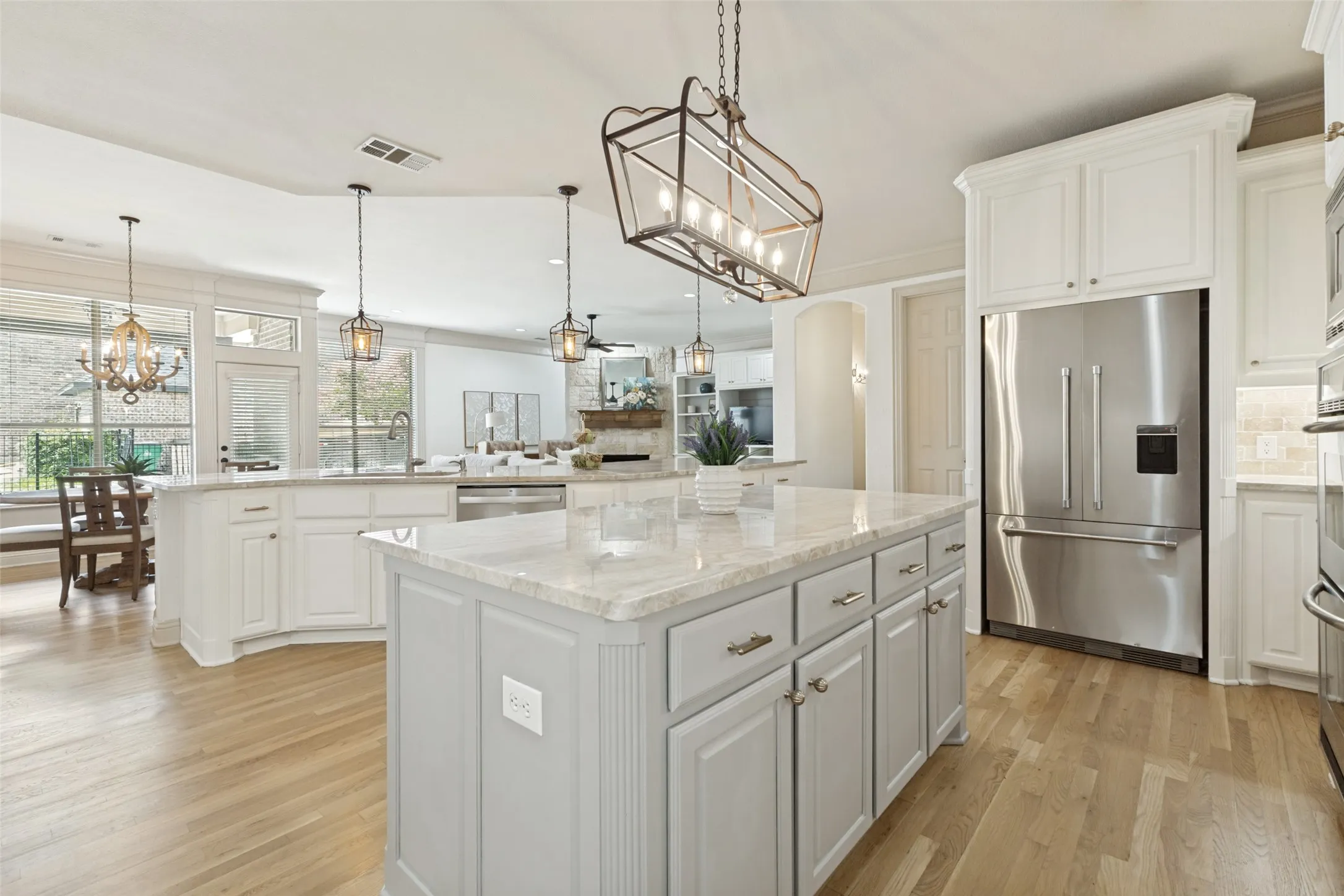 Quartz counter tops glow with elegance. Check this frig outr