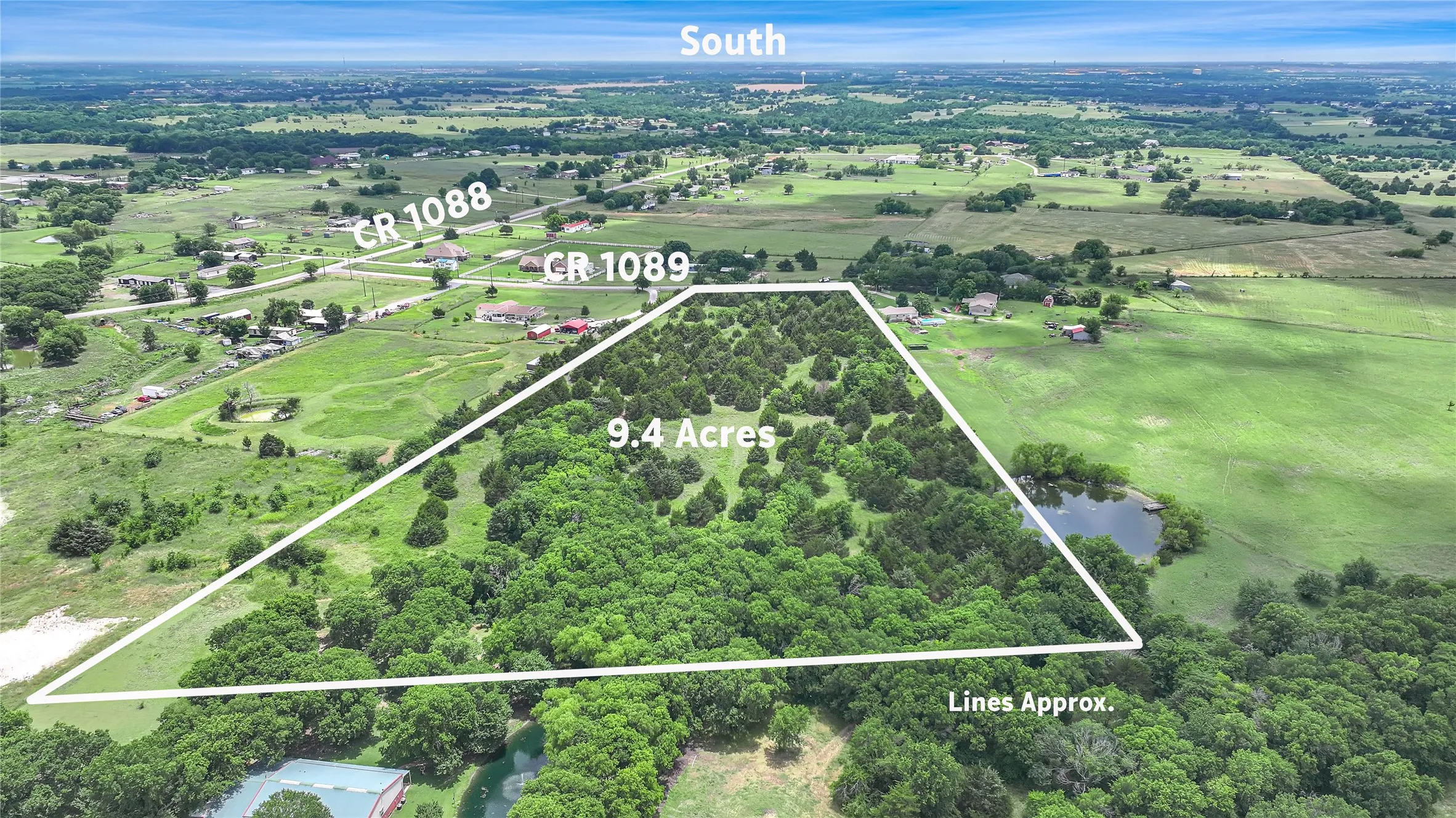Expansive 9.4-acre parcel featuring mature trees