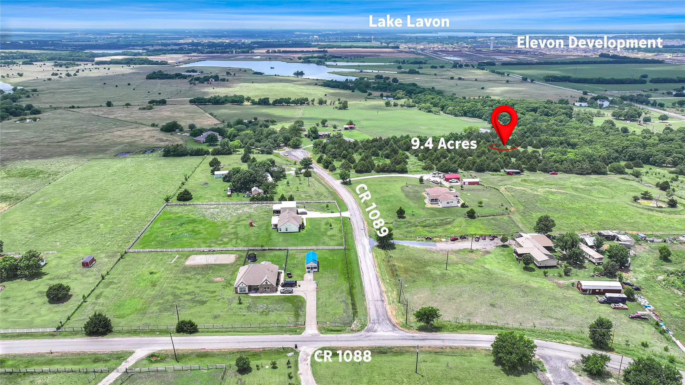 Expansive 9.4-acre parcel featuring mature trees and a natural landscape