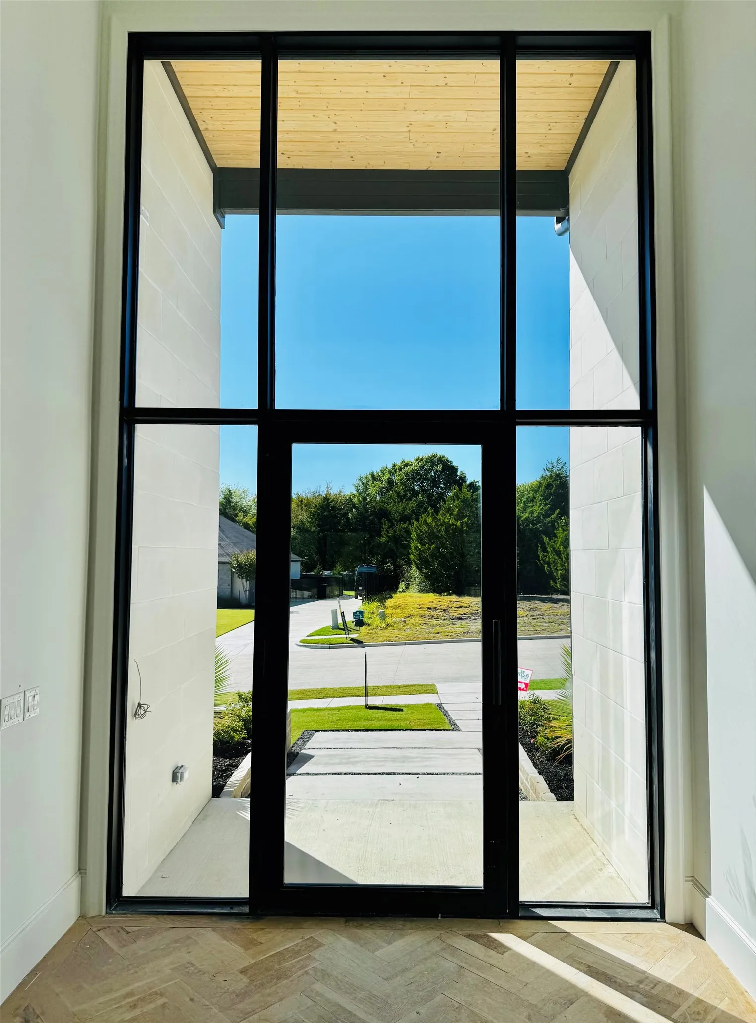 All glass one piece metal entry unit.
