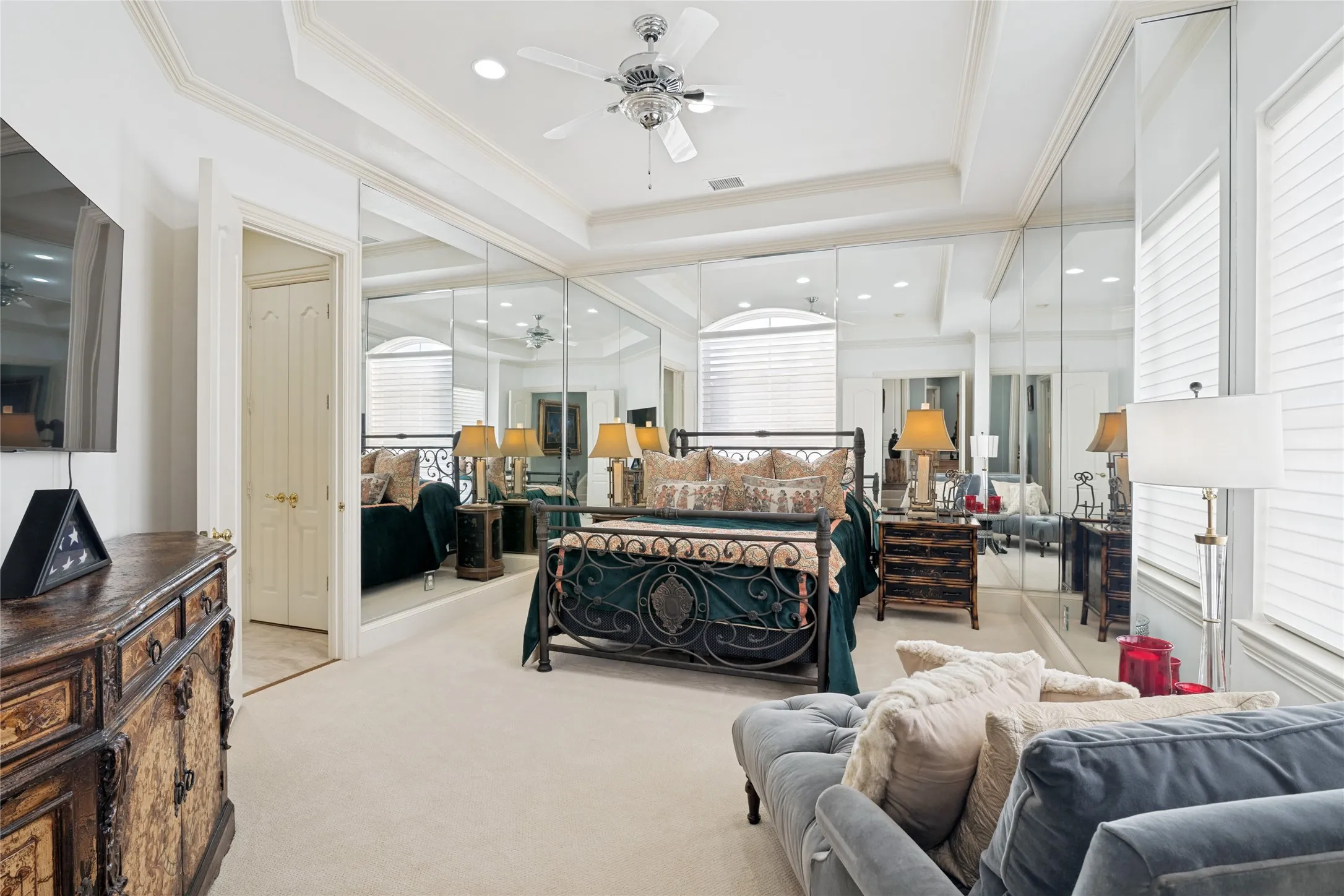 Second Primary Bedroom with spacious ensuite bath and balcony