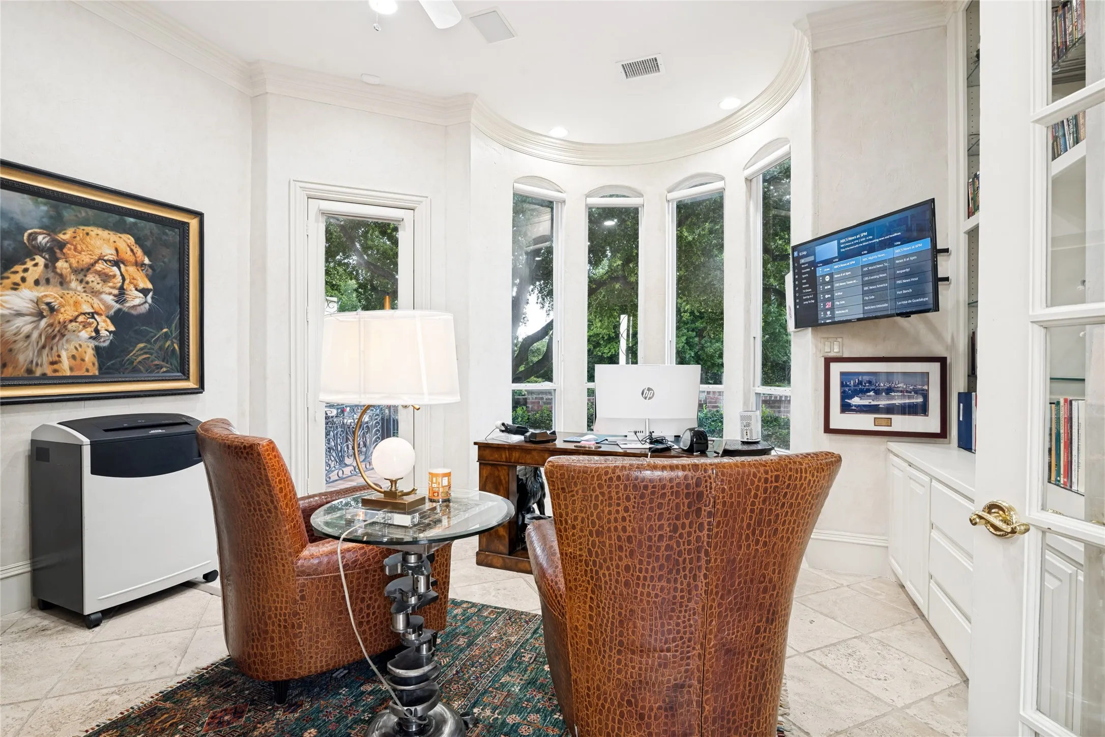 Bay window and built in
Exterior door to private grassy area.