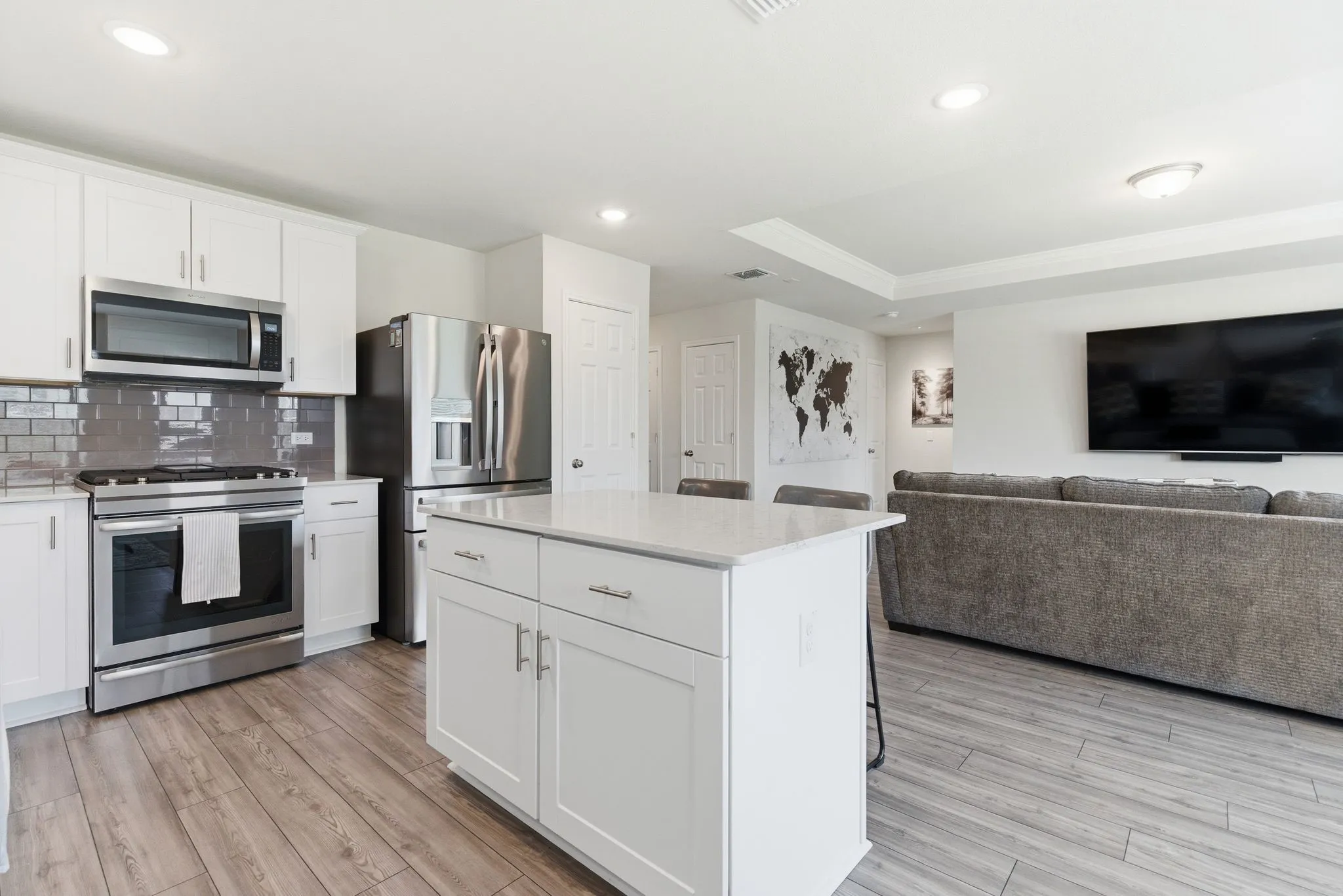 Open-concept kitchen featuring an island