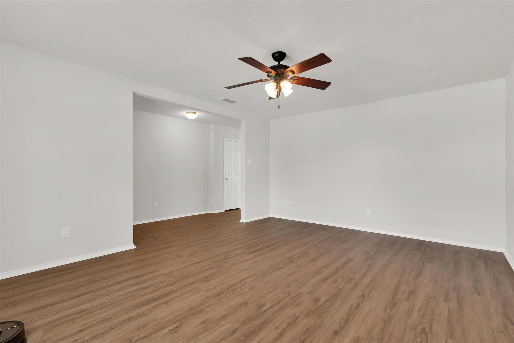 Newly installed Luxury Vinyl plank throughout