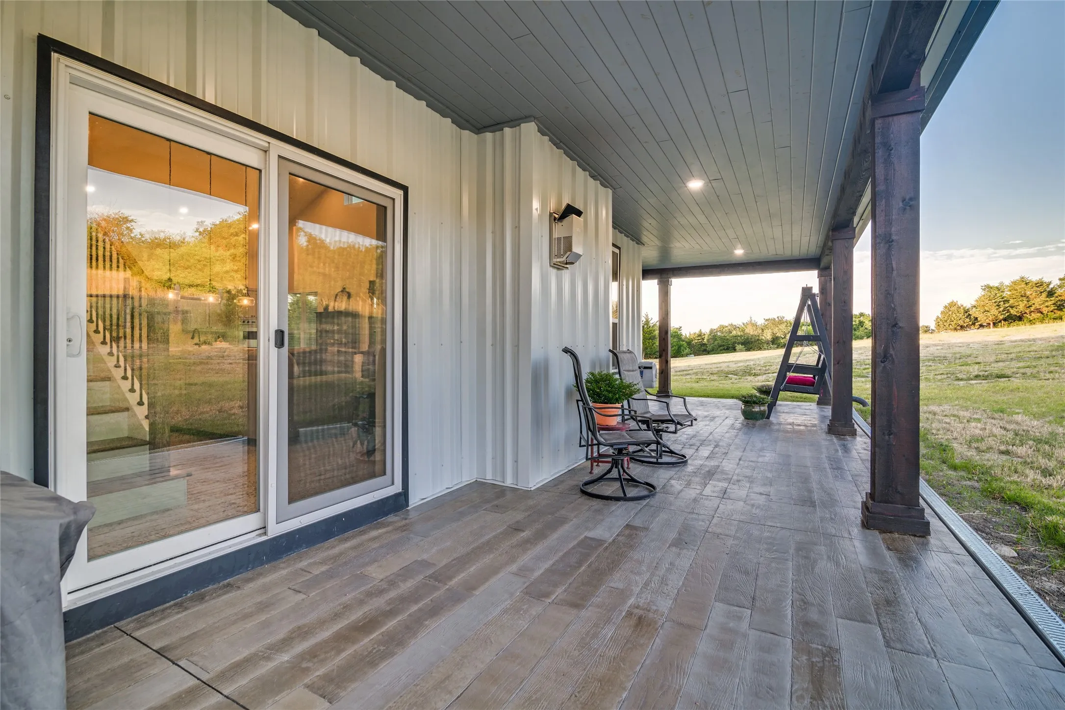 side porch. sliding glass door - entrance to living room