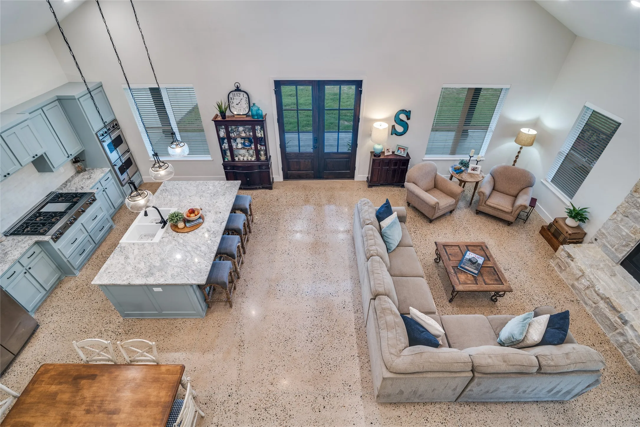 View of living room from top of stairs