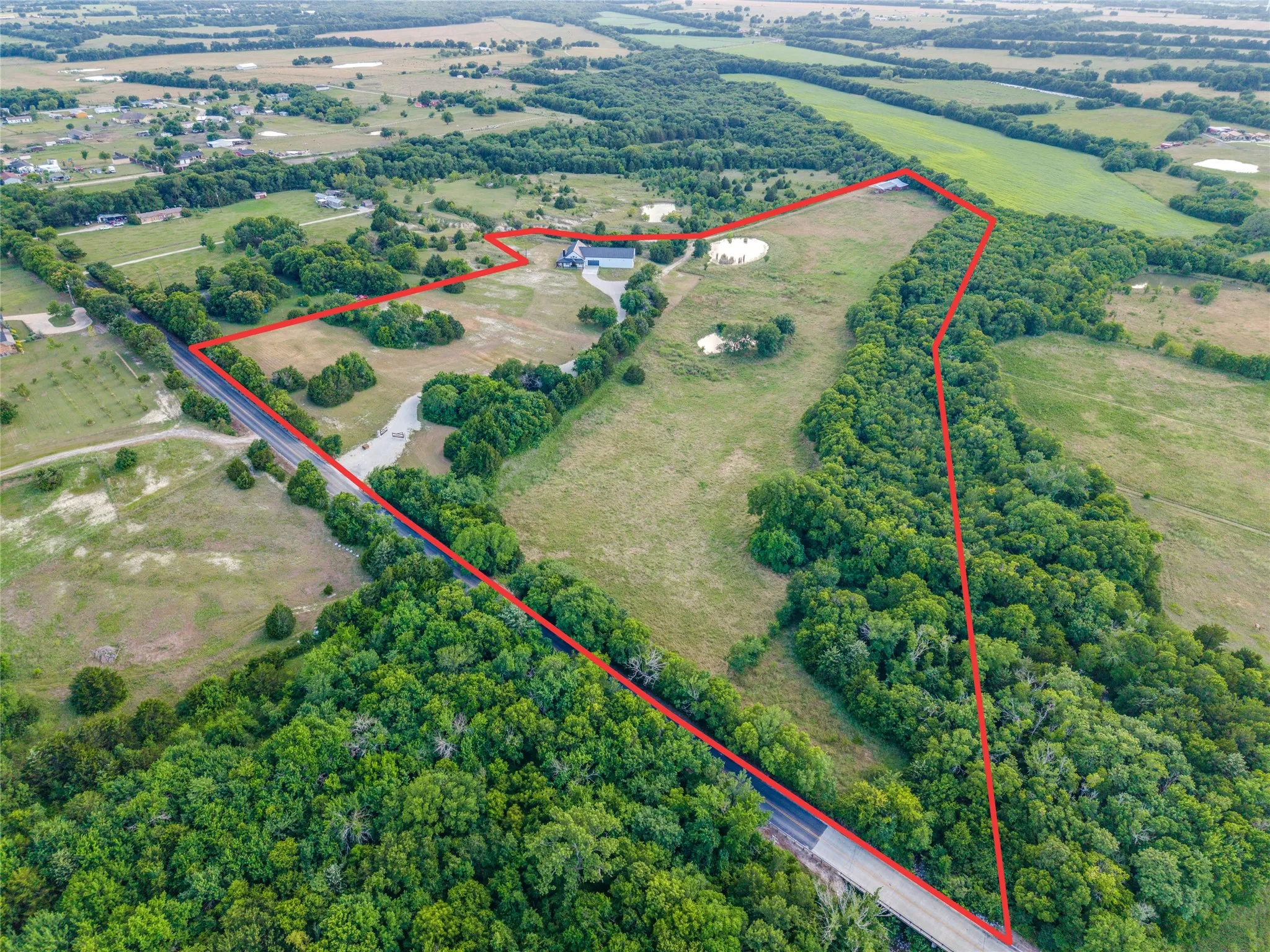 +/- 900' of road frontage