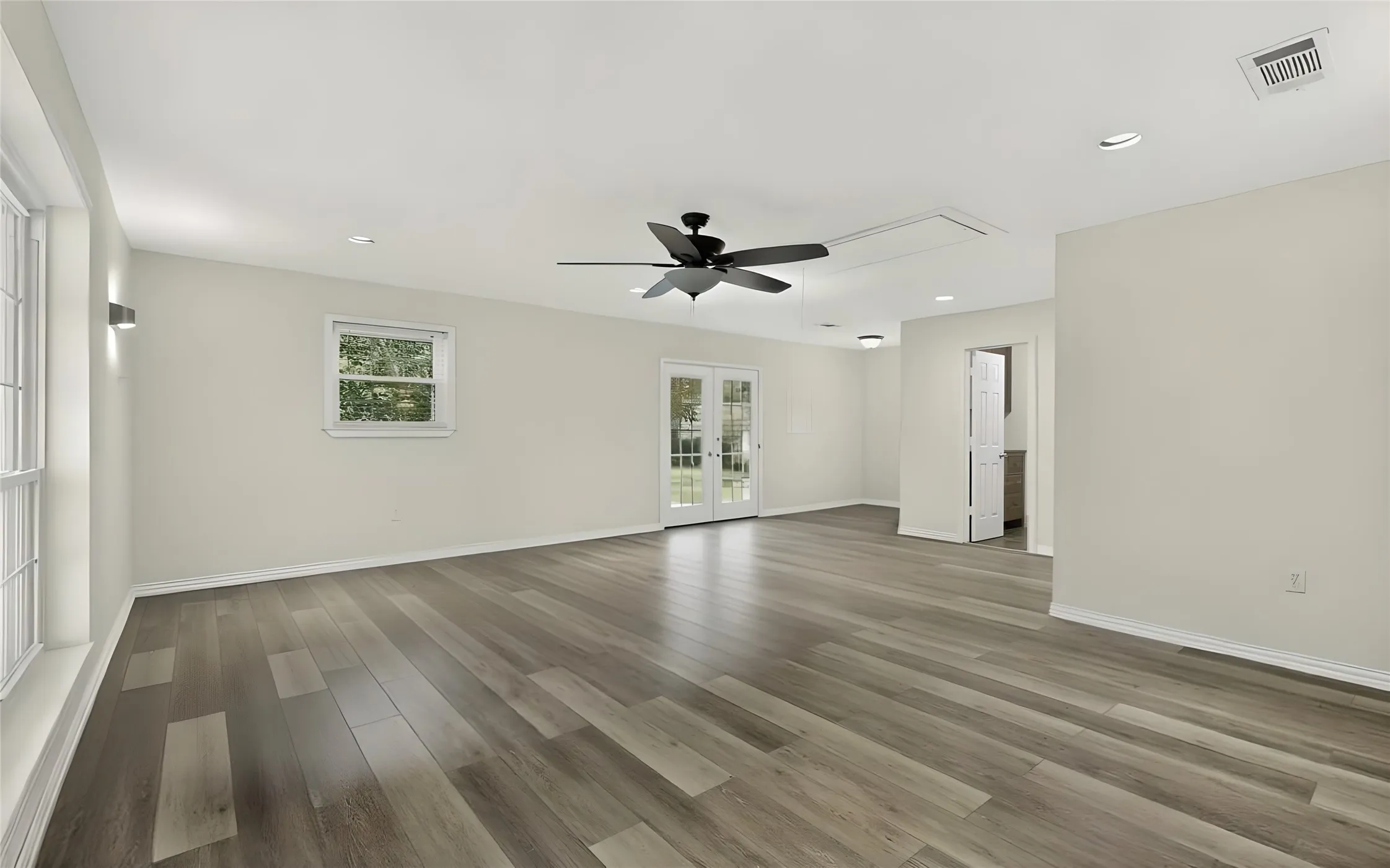 Second living can be used as living and dining space. Newly installed luxury vinyl flooring.