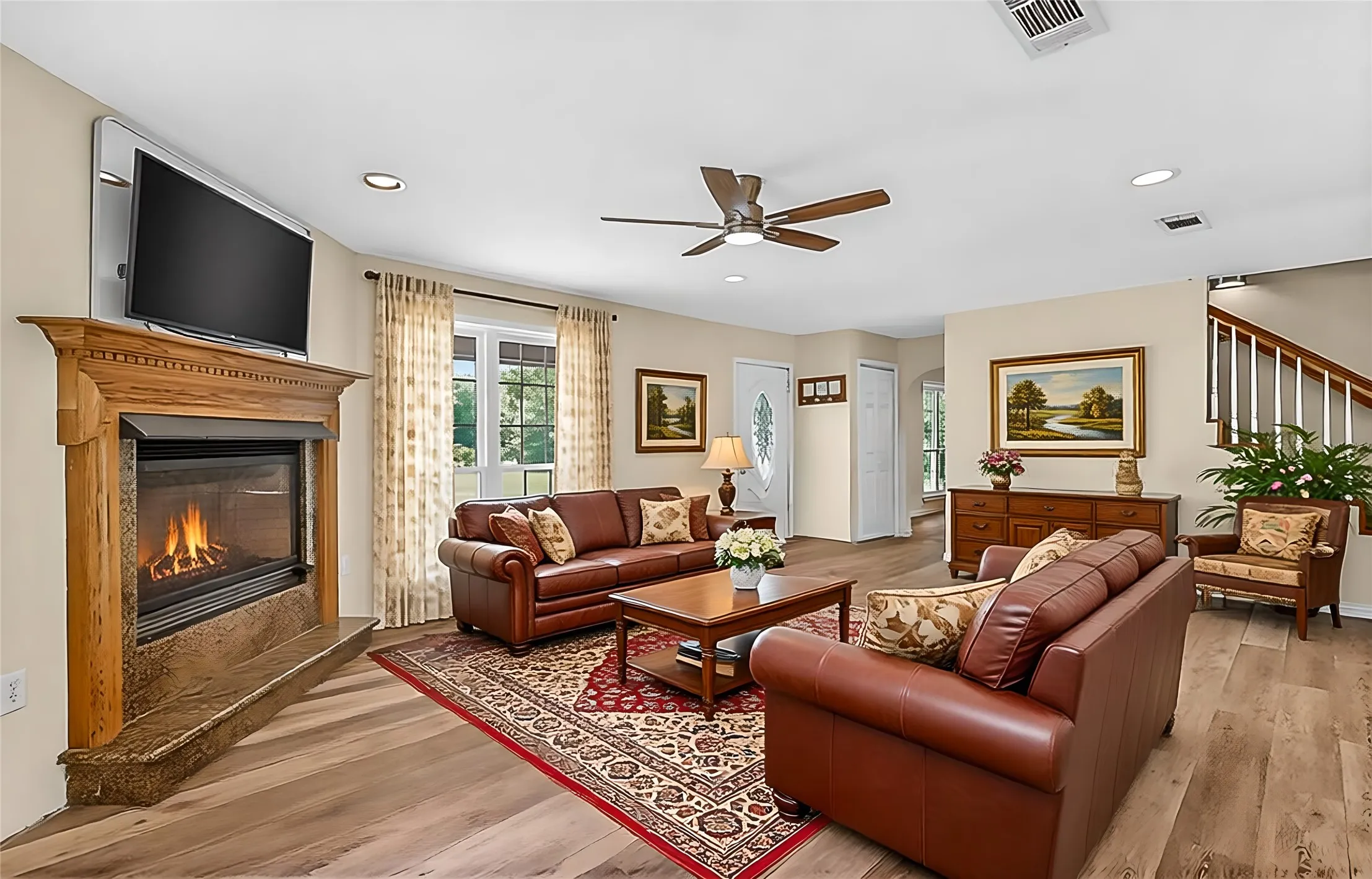 Family room and fireplace. Virtually staged.