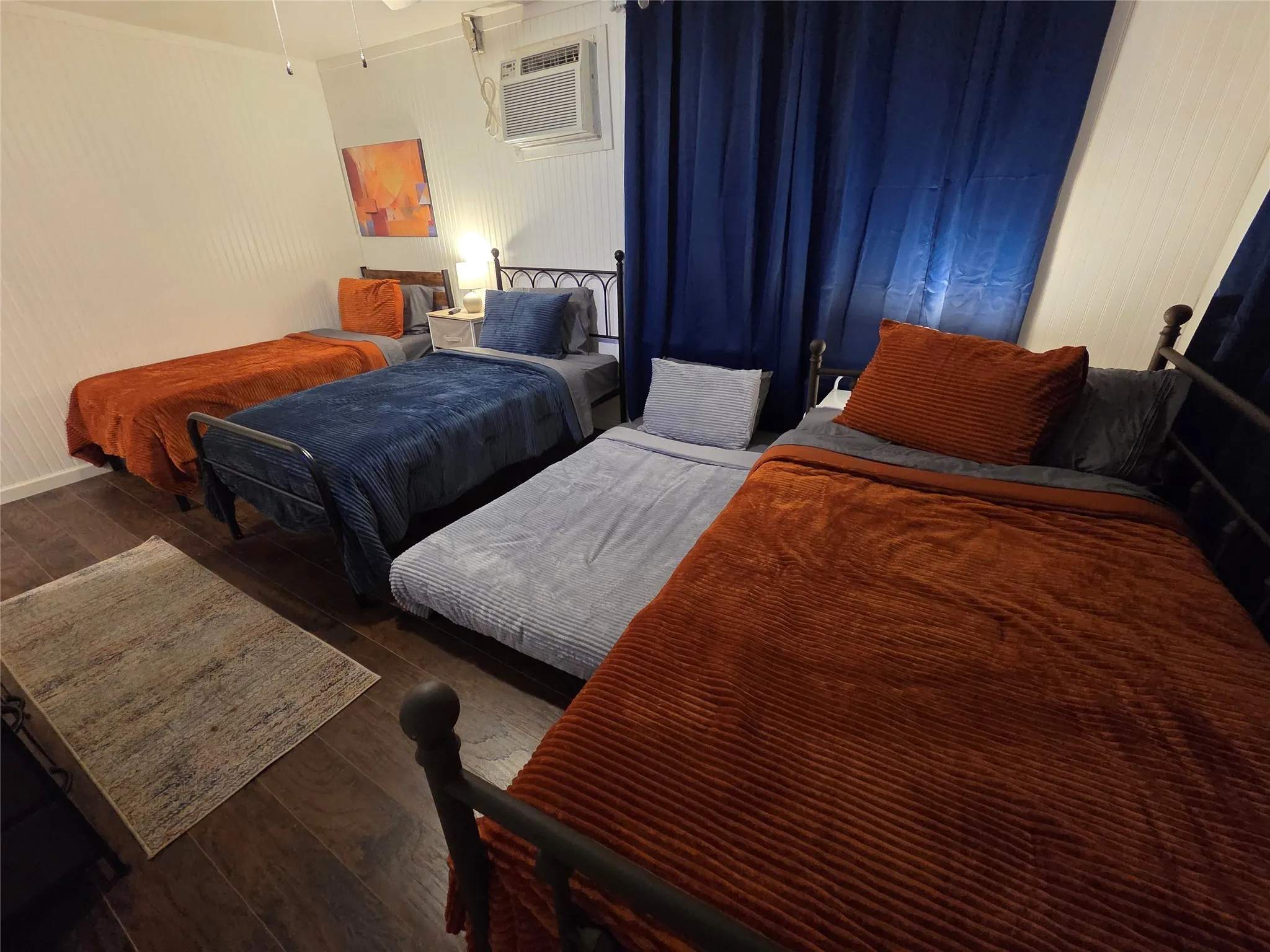 What the bedroom looks like with all four twin beds in use. **PLEASE NOTE WE ARE WILLING TO CHANGE THE BEDS IF THIS ARRANGEMENT DOES NOT WORK FOR YOU**