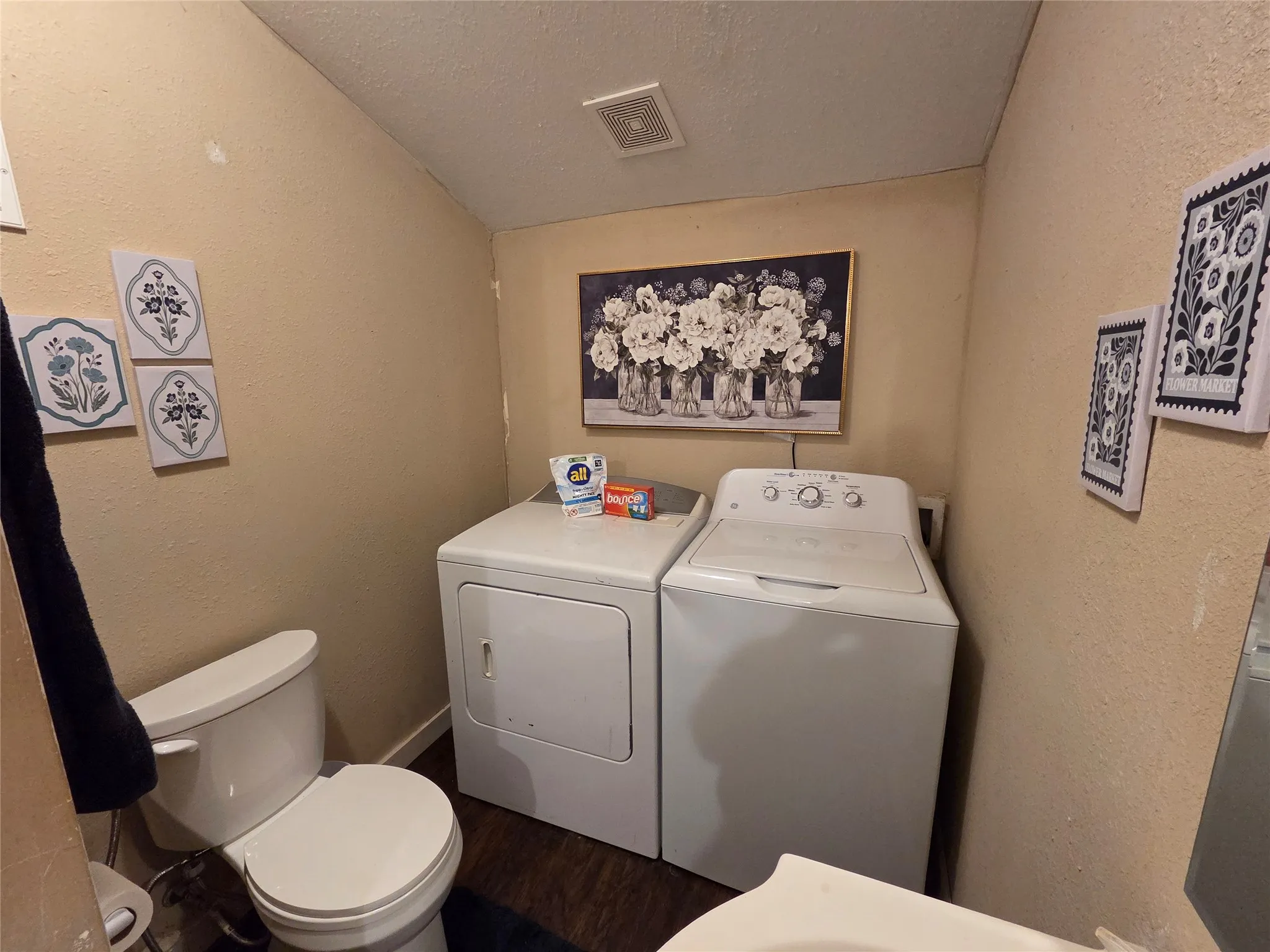 Full size washer and dryer located in the bathroom