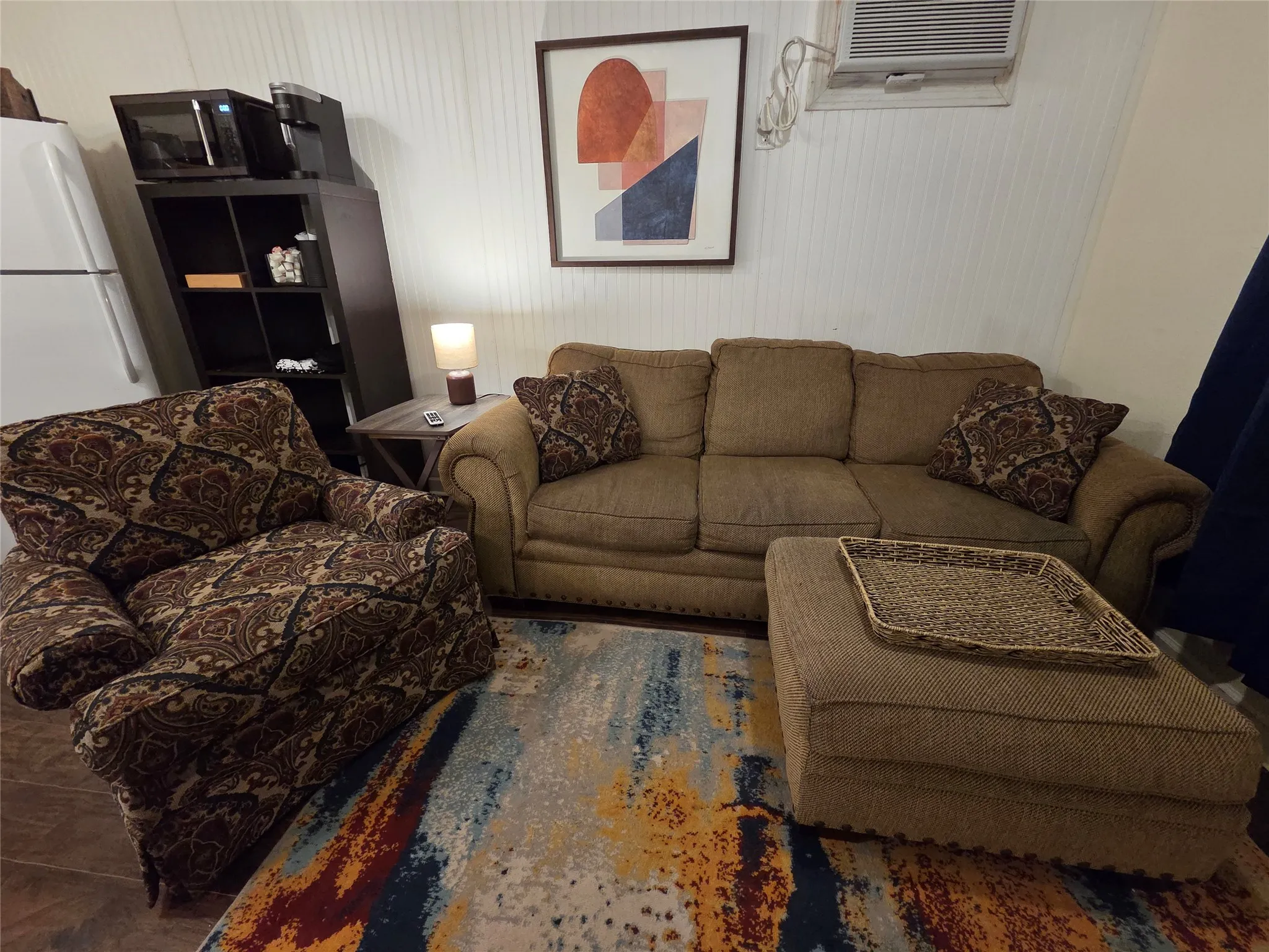 Comfy living room furniture with seating for four. **PLEASE NOTE WE ARE WILLING TO REMOVE THE FURNISHINGS IF YOU ARE INTERESTED IN AN UNFURNISHED RENTAL AT A LOWER RATE**