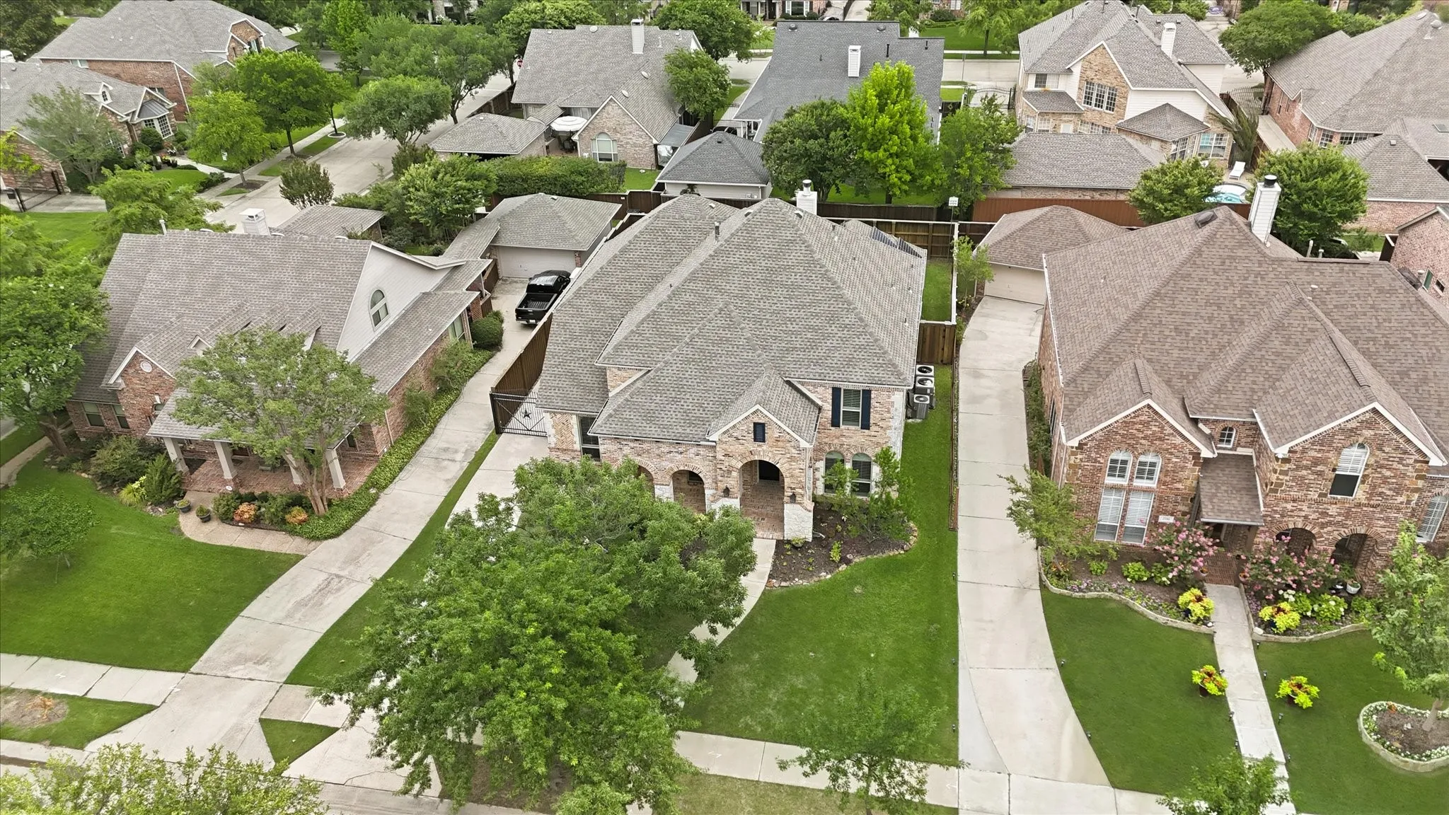 Aerial view of home from above park.