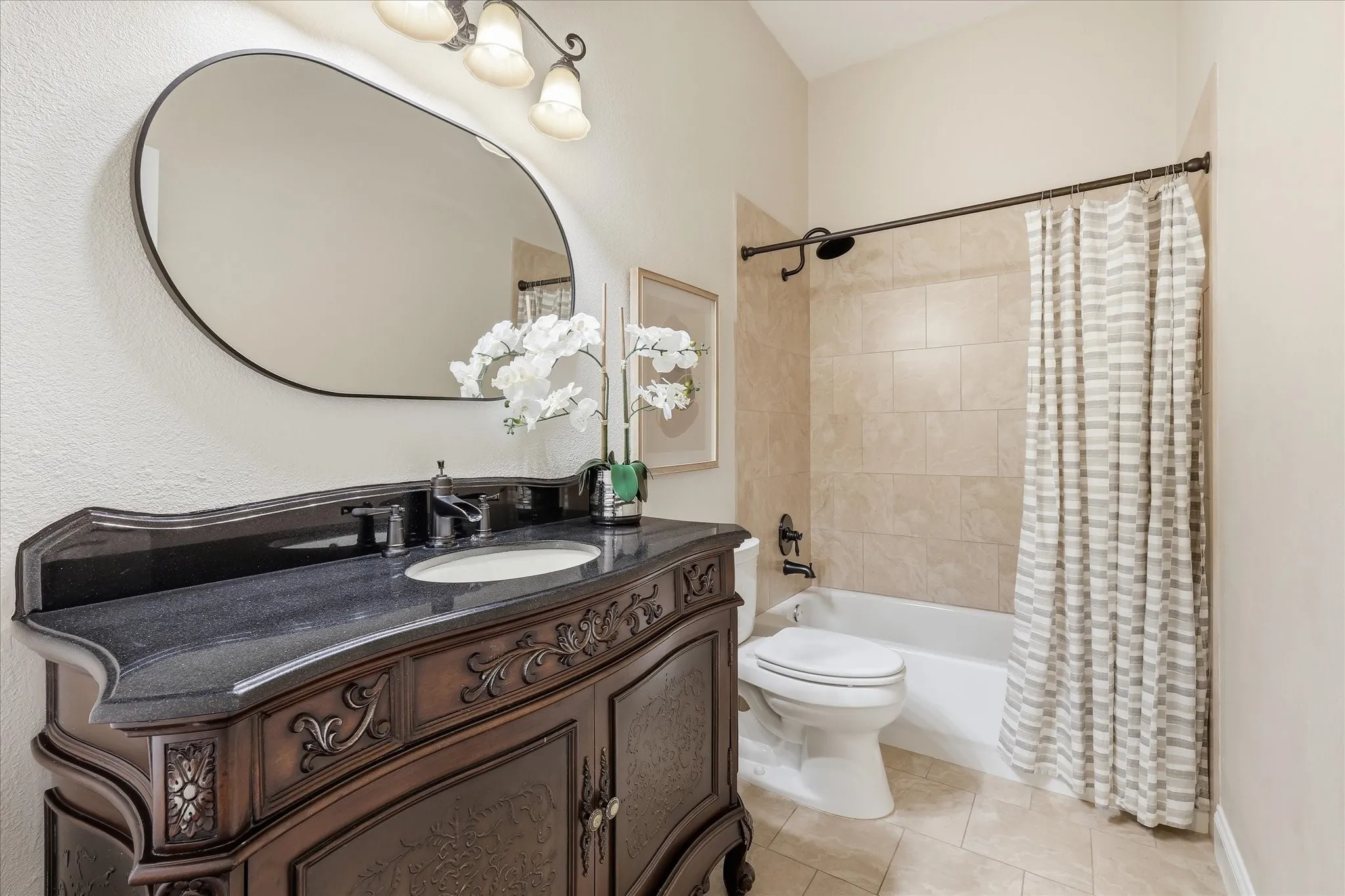 Full bathroom just outside secondary downstairs bathroom.