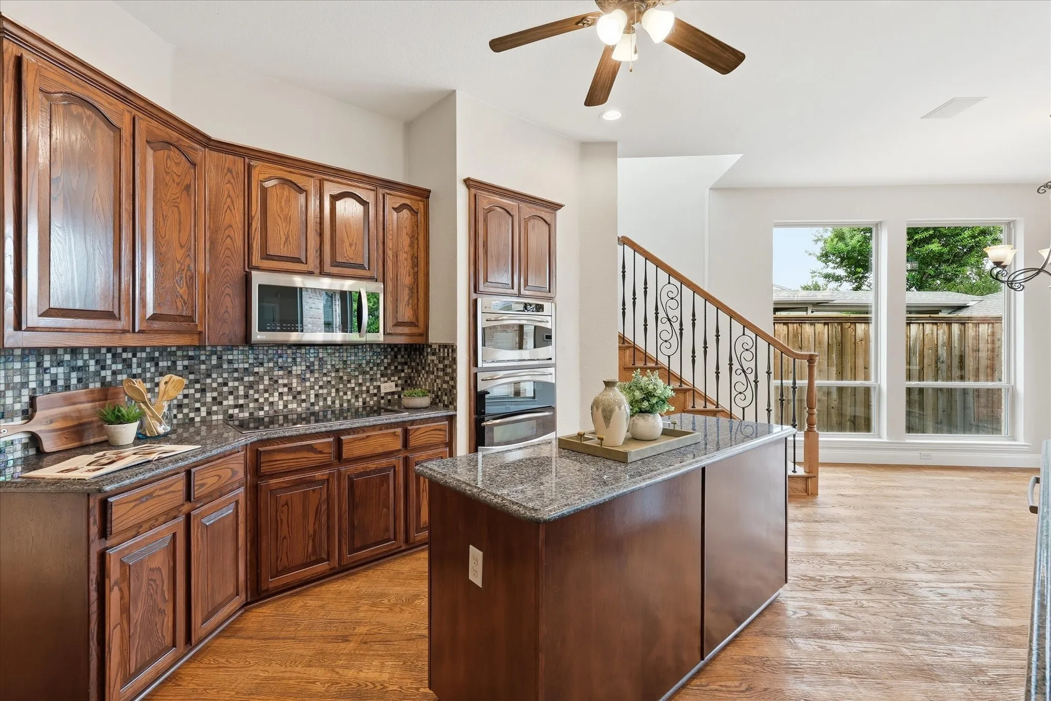 Coming into the kitchen from the entry/bottom of first staircase area
