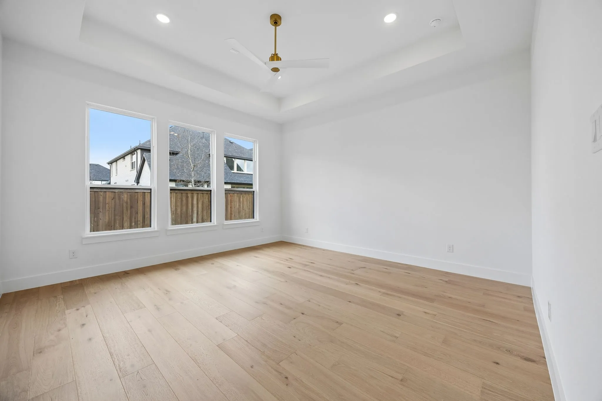 Featuring a wall of windows, high ceilings and beautiful flooring, this owner's suite is exactly what you have been searching for!