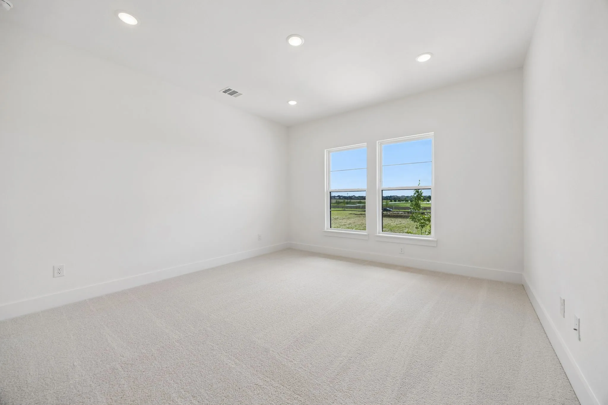 You'll enjoy nicely sized secondary bedrooms in this custom floor plan.