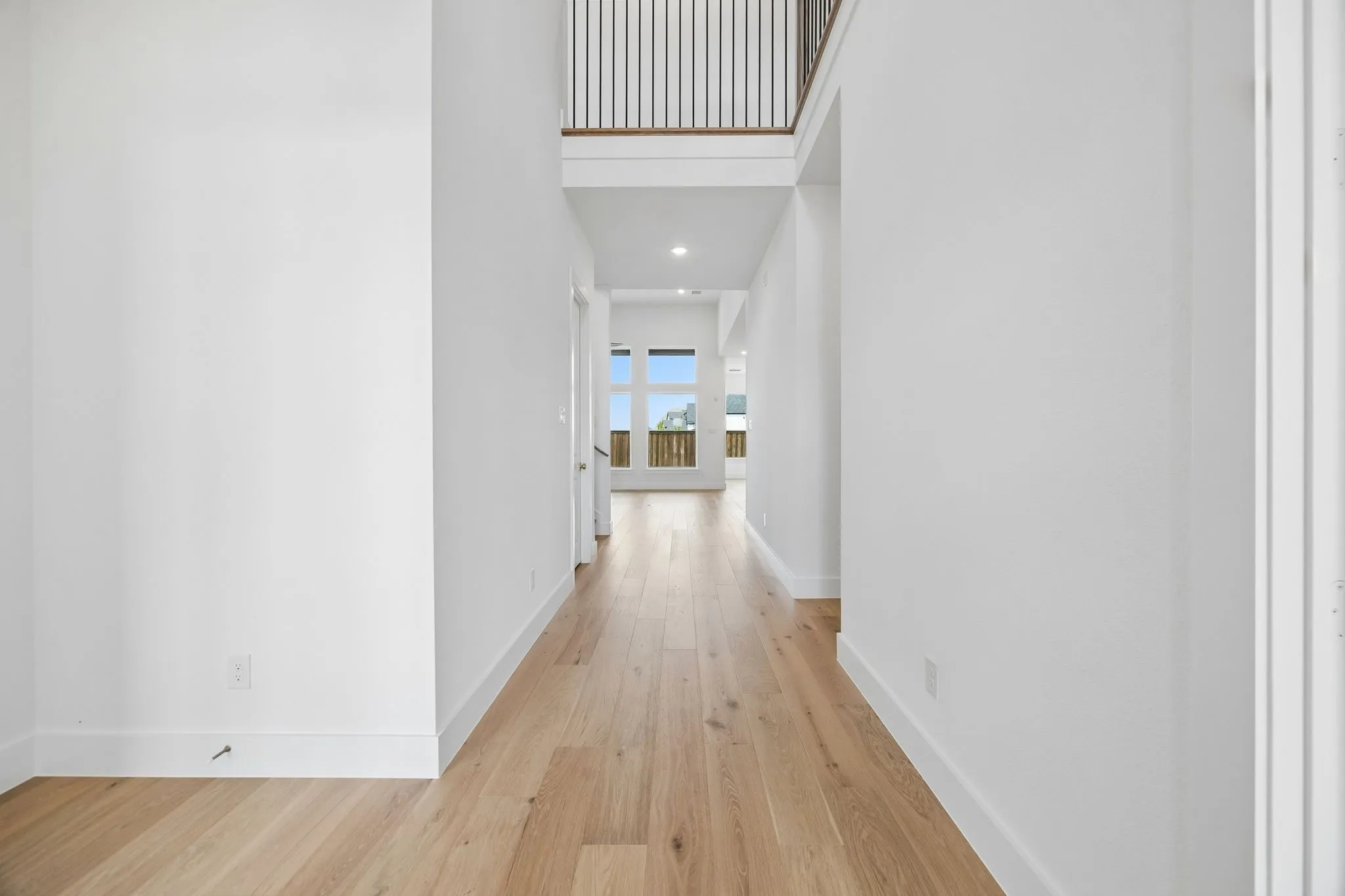 With sight lines from the front through to the rear of the home and ample space to display art work, this lovely entry is the perfect place to welcome family and friends into your new forever home!