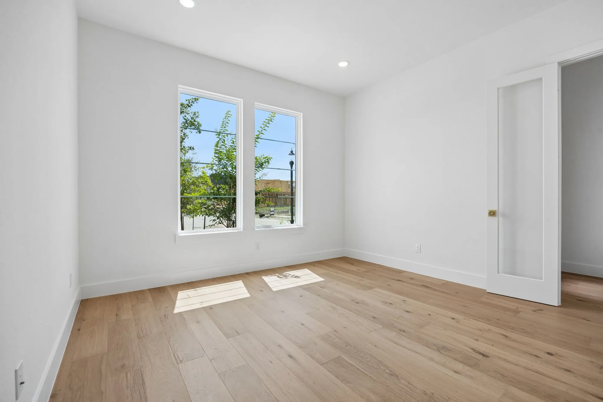 The professional needing to work from home will appreciate this light filled, private home office.