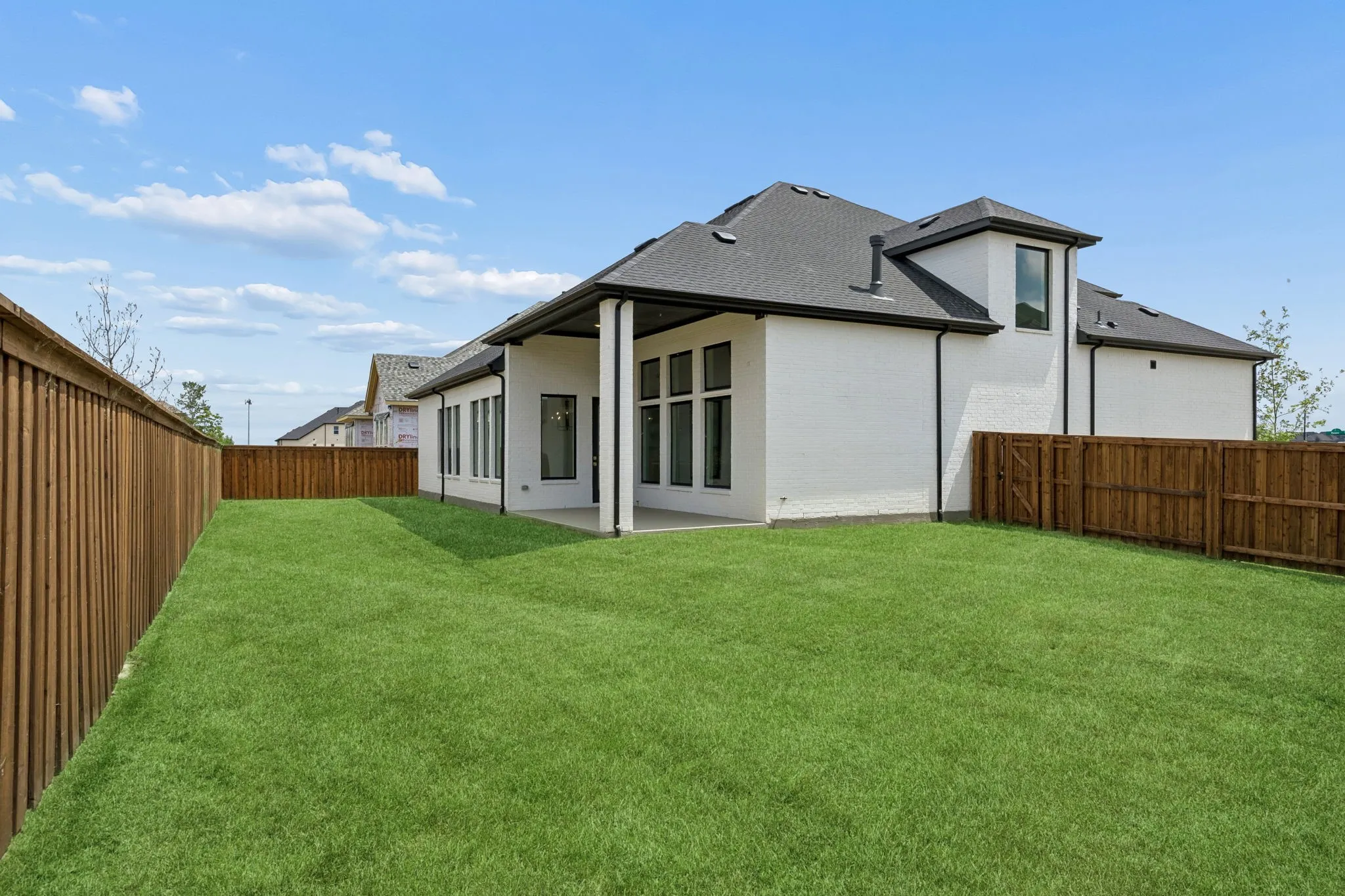 You'll love hosting summer family bbq's in this wonderful fenced back yard with covered patio.