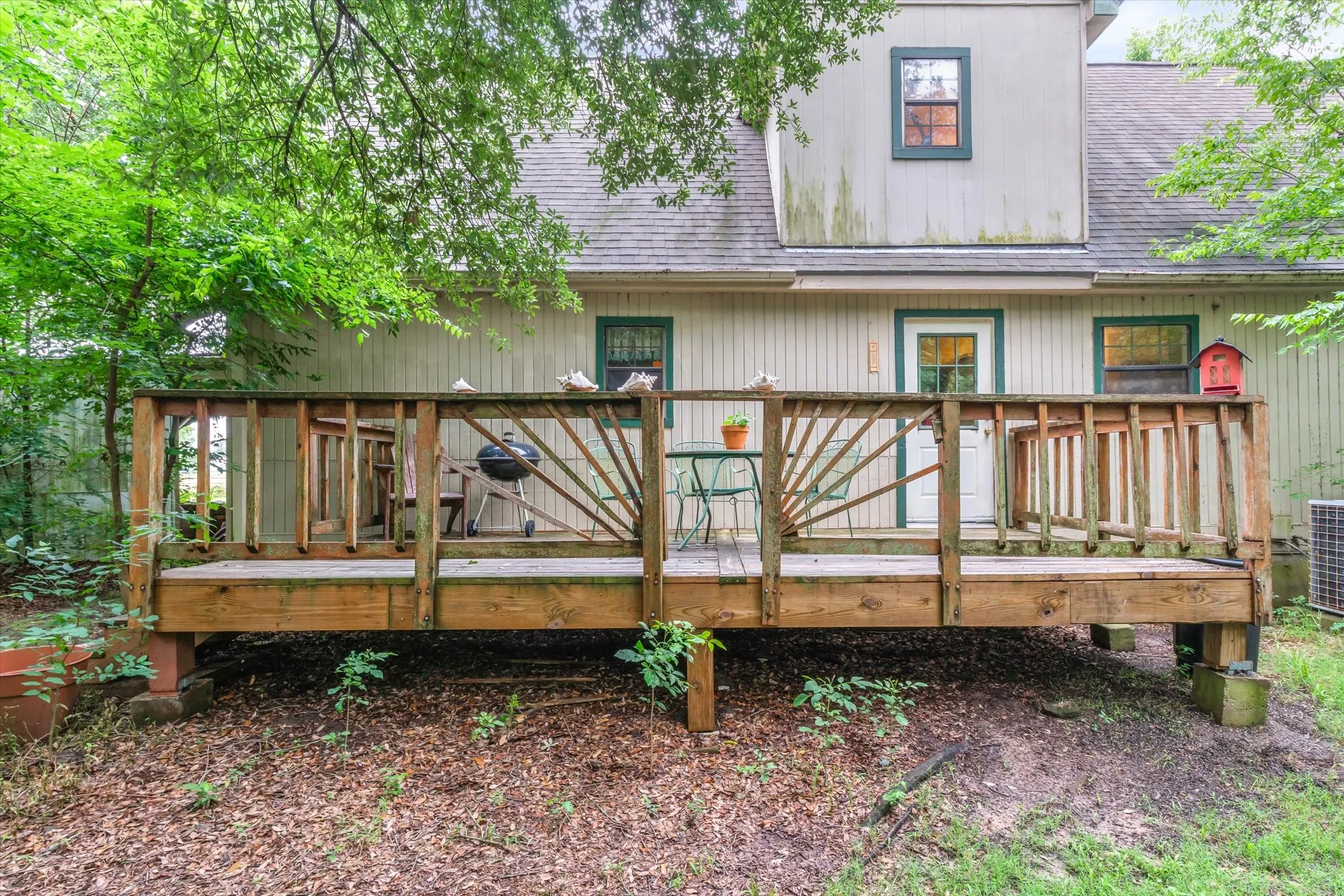 Back deck for entertaining or just enjoying the tranquil setting.