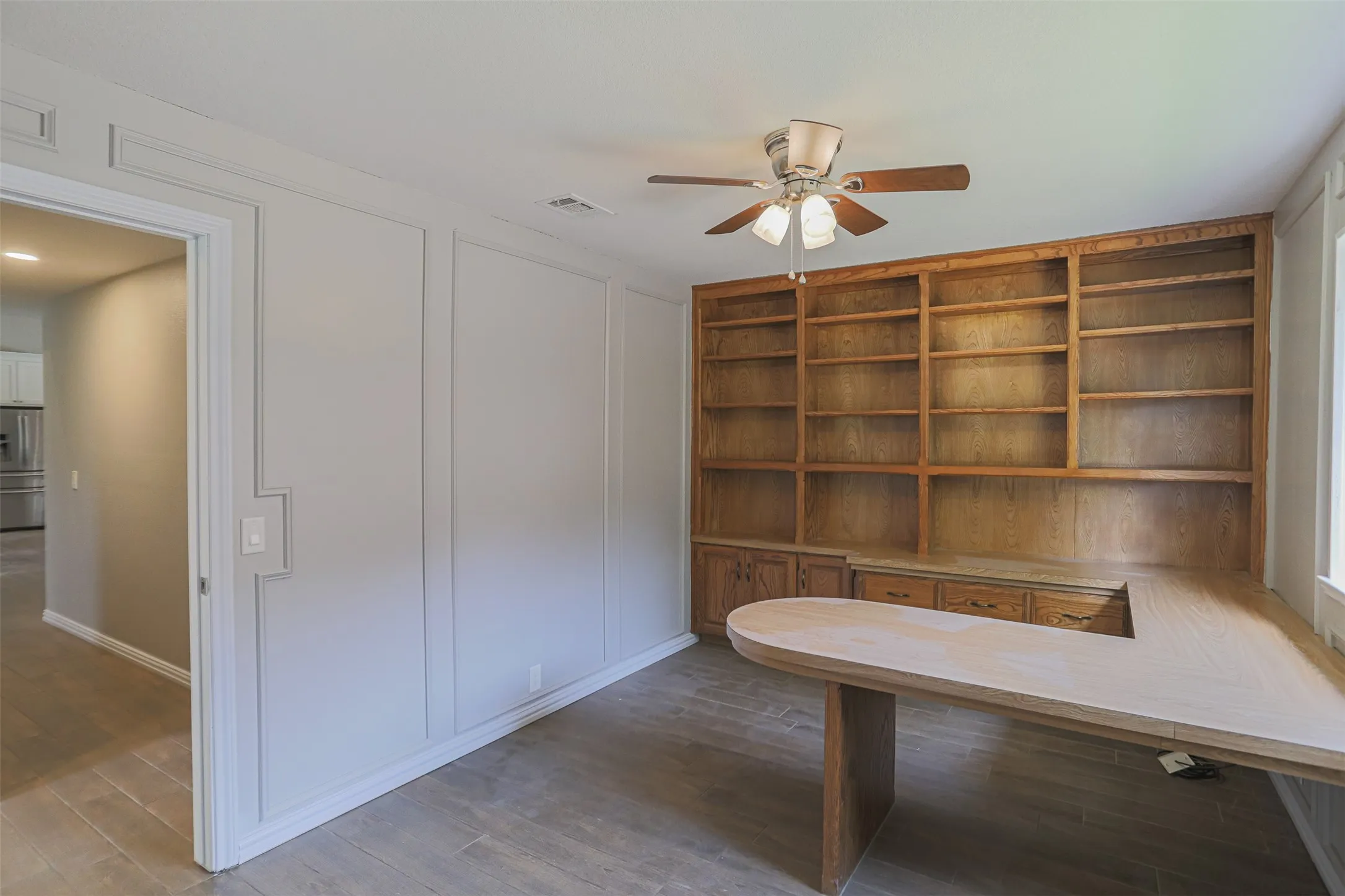 Custom Built-in shelving creates the perfect home office, library, or study.