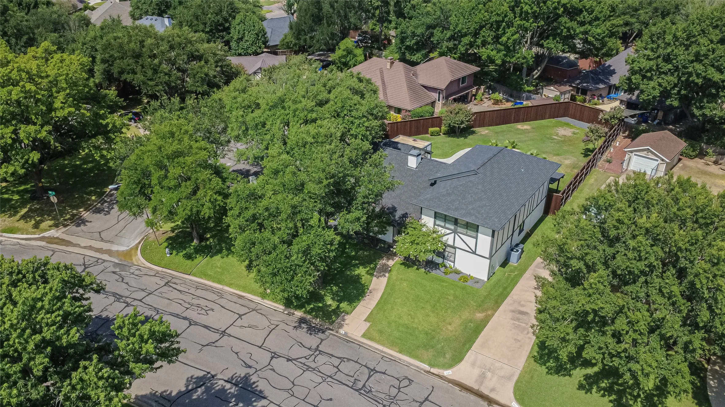 Perspective showing the home's location within the established neighborhood.