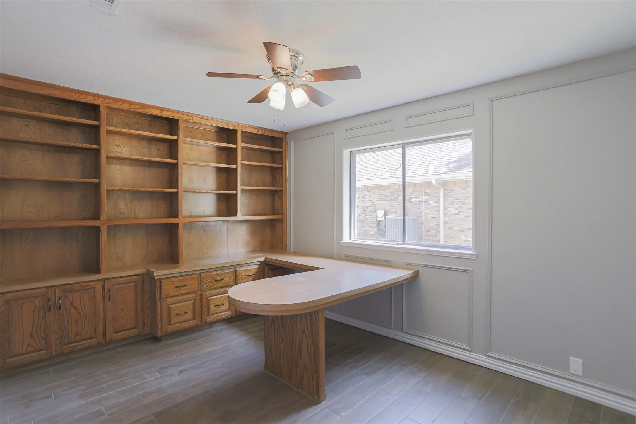Built-in shelving creates the perfect home office, library, or study.