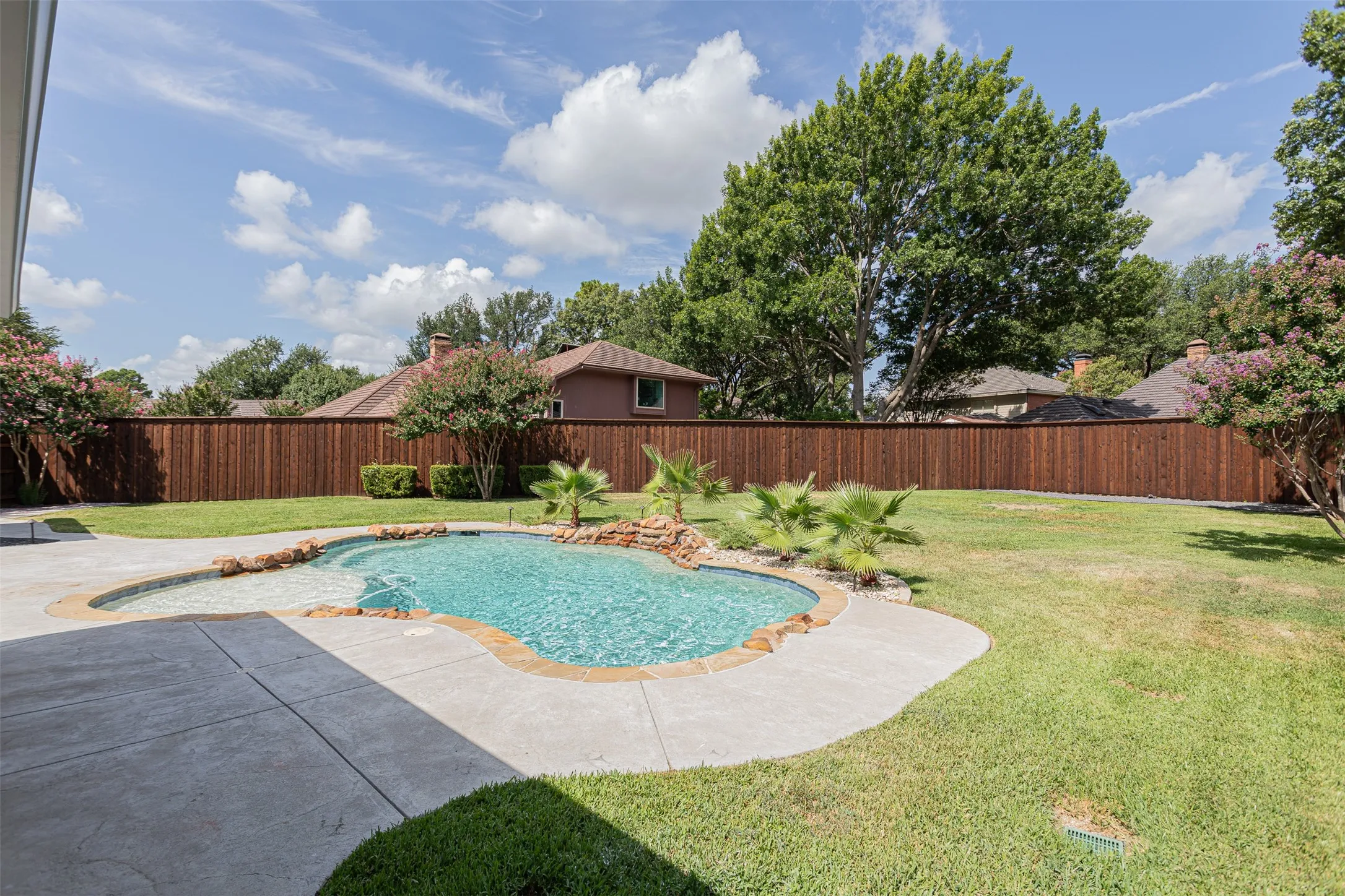 Rear yard highlighting privacy fencing and outdoor living potential.