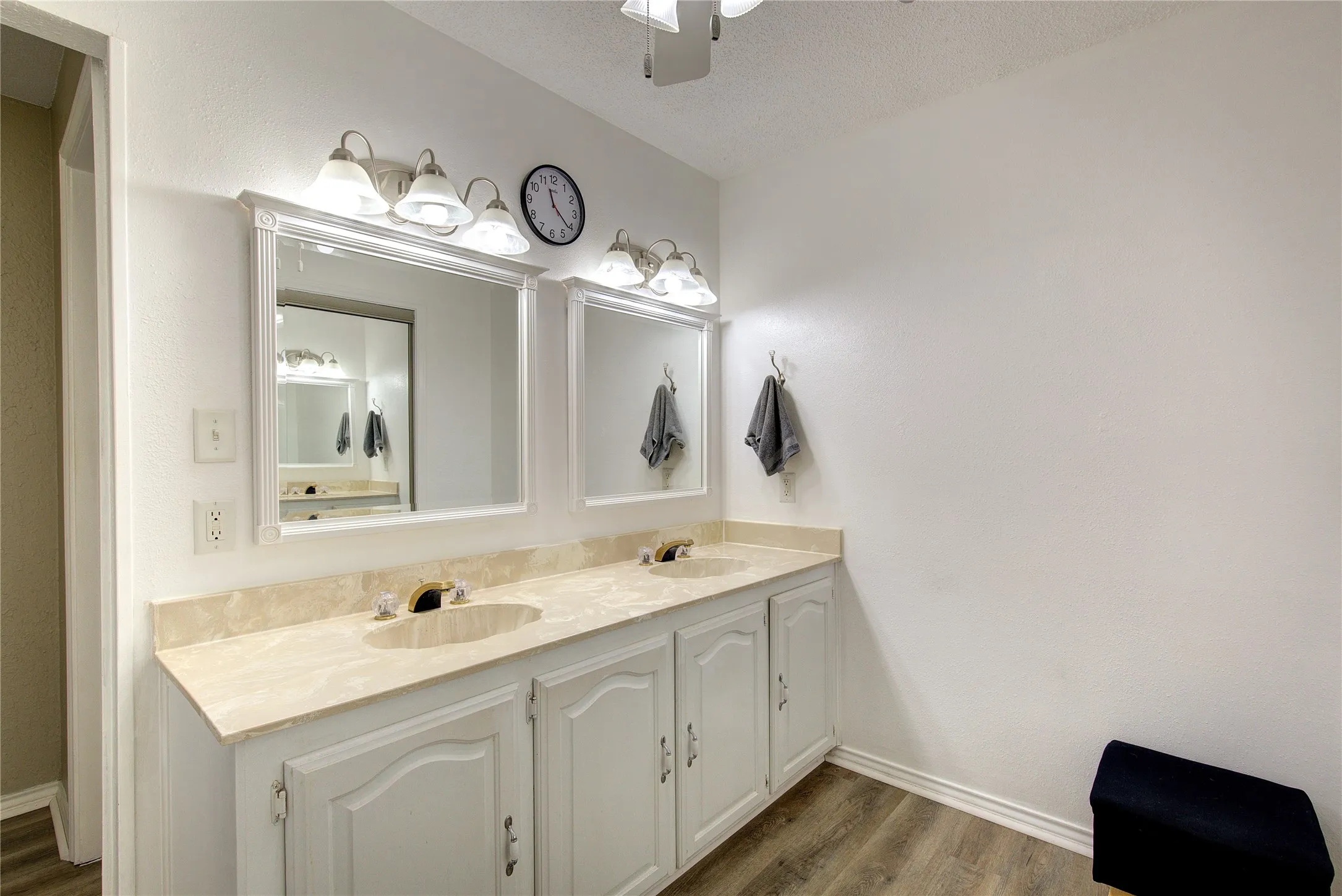 Primary ensuite bath upstairs has double vanity, walk0in closet, side closet AND linen closet!  Plus, separate potty and shower.