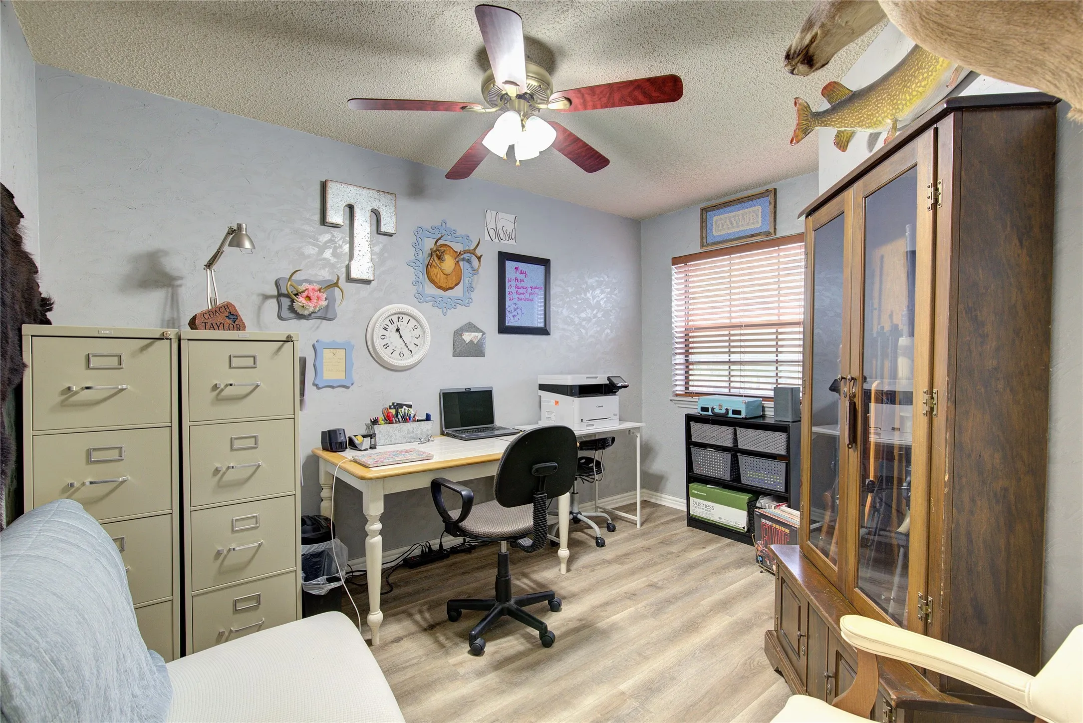 This room tucked between the upstairs primary bedroom and its ensuite bathroom can be used as an office, nursery or hobby space.