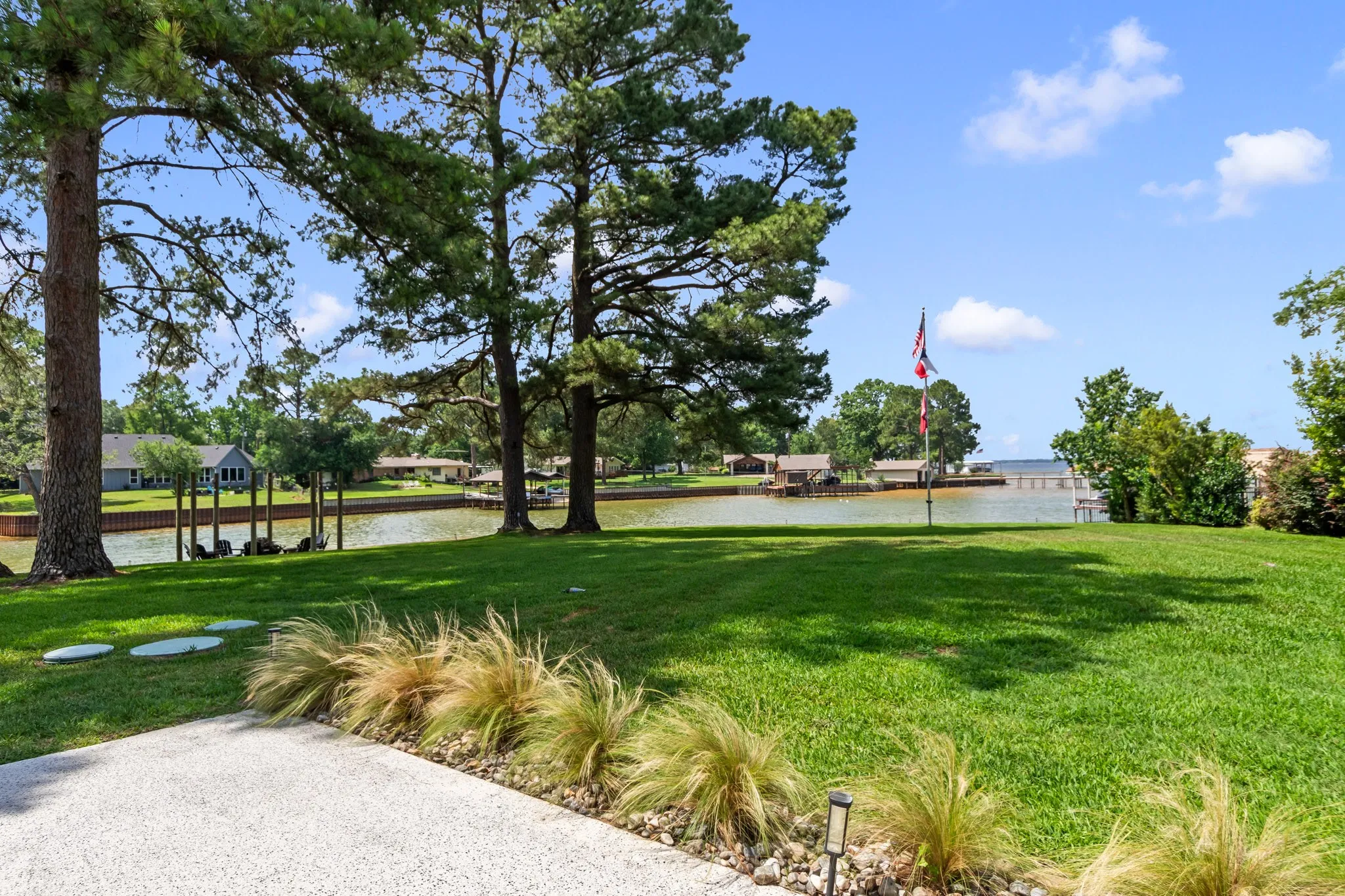 Enjoy the Beauty of Lakeside Living with cove and open water views from back patio