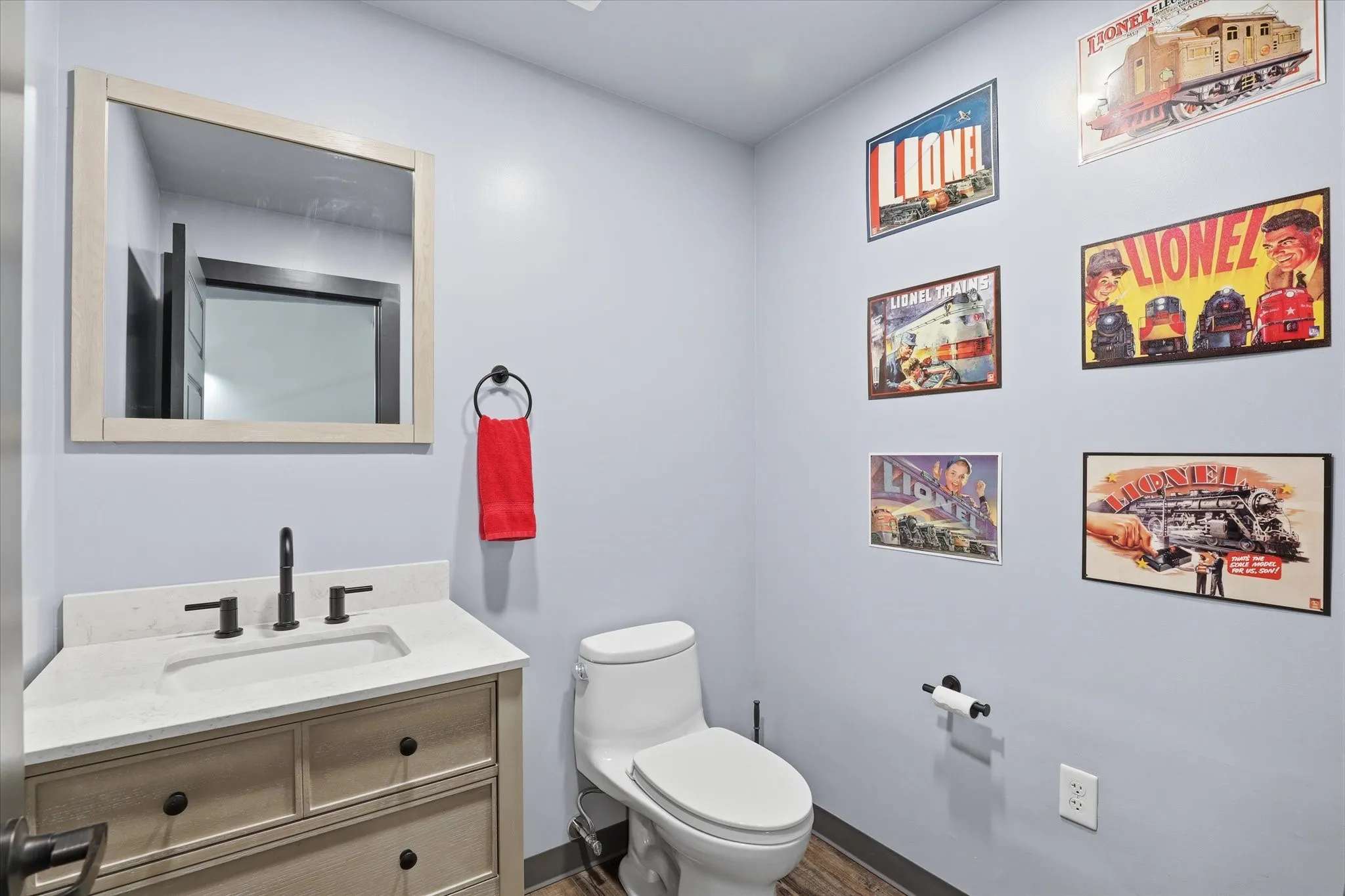 Well-appointed private half bath in loft