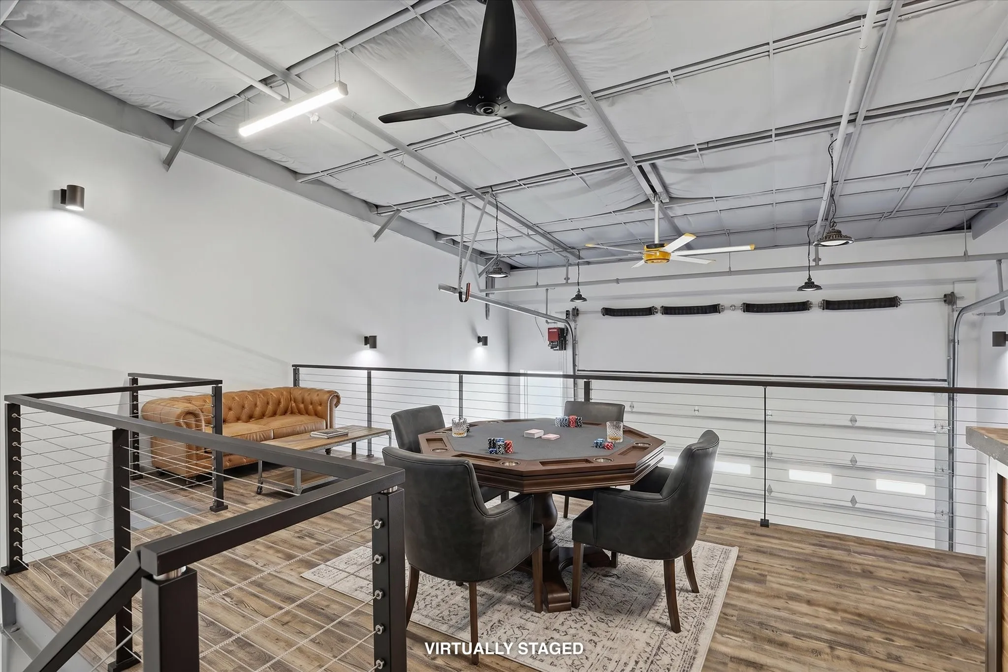 Loft area (virtually staged with furniture)