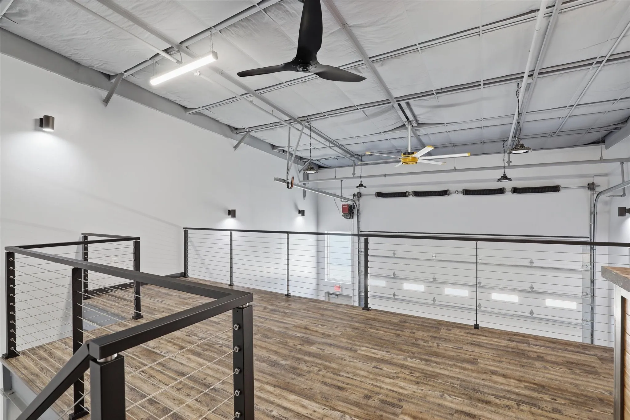 Luxury vinyl plank flooring throughout loft