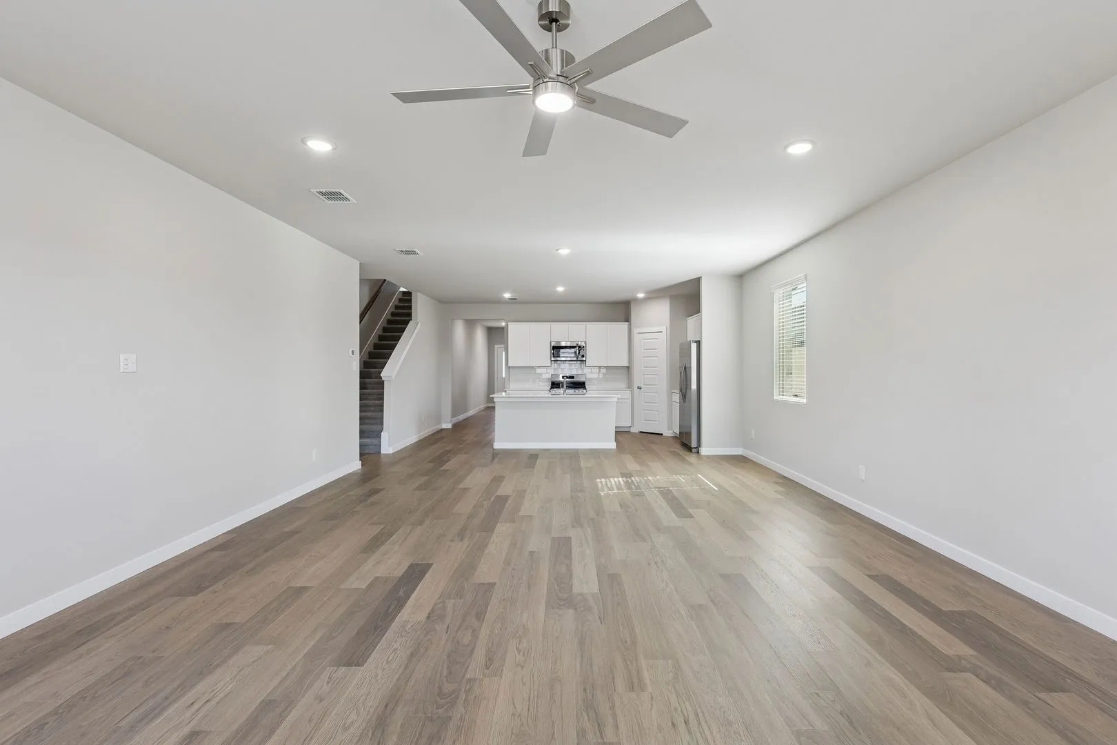 Open First Floor in the Holden home plan by Trophy Signature Homes – REPRESENTATIVE PHOTO