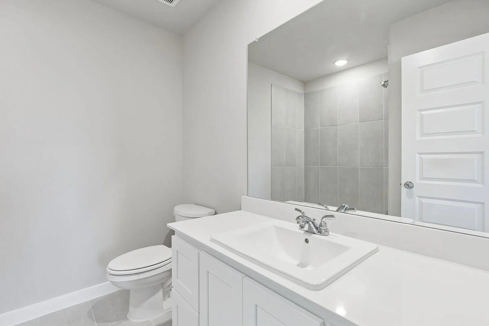 Bathroom in the Holden home plan by Trophy Signature Homes – REPRESENTATIVE PHOTO
