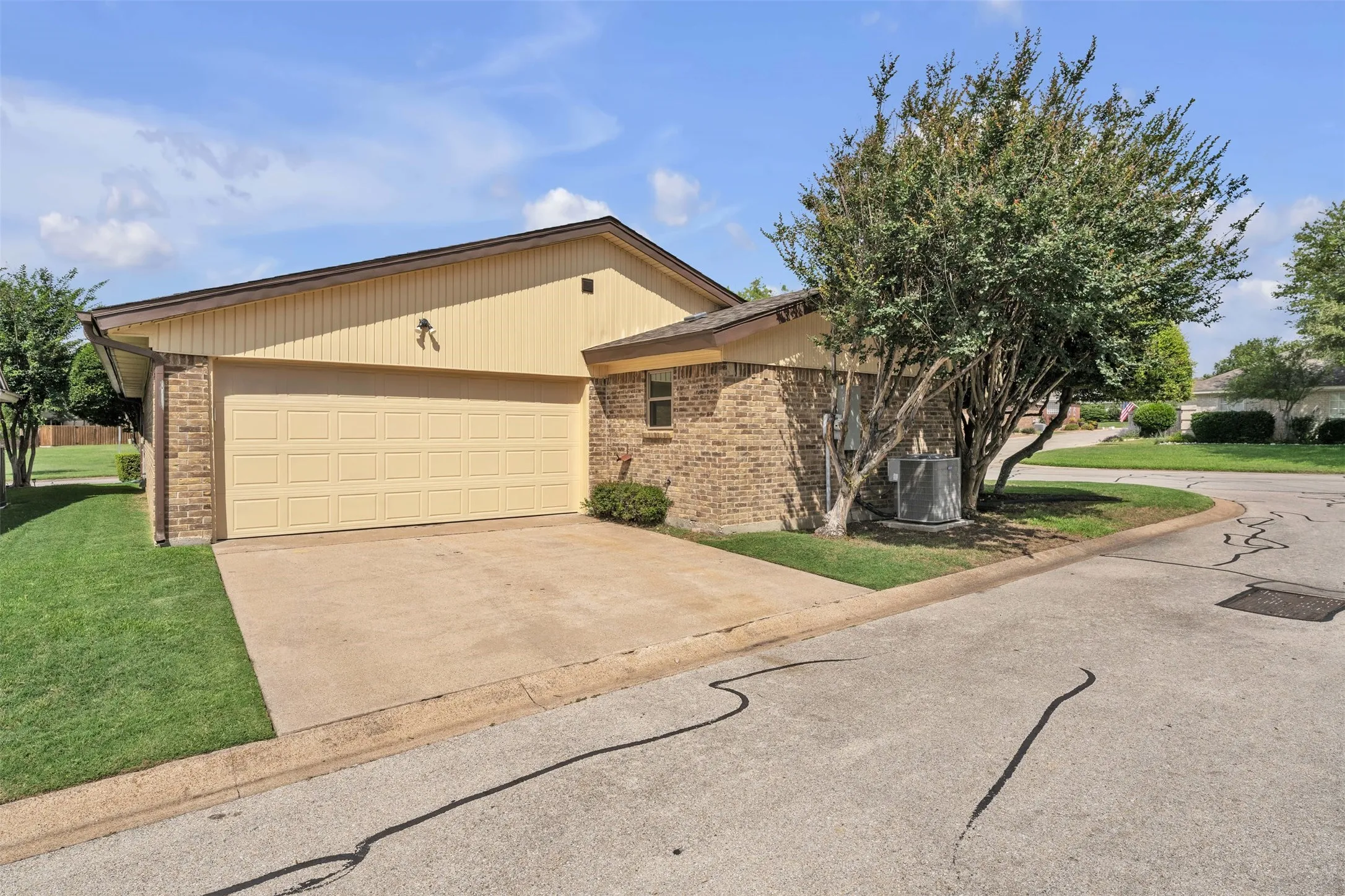 Rear garage and drive.