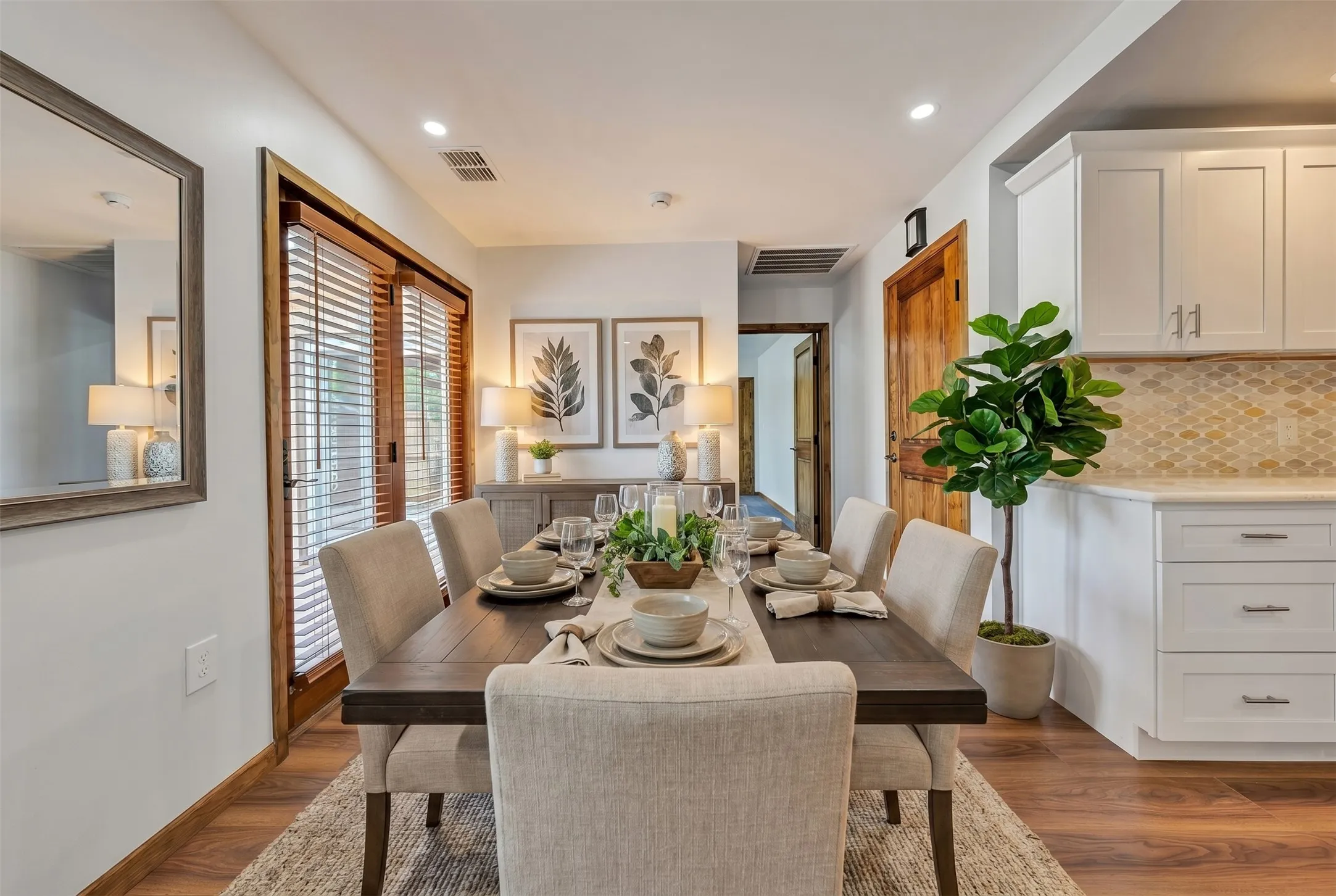 Virtually Staged. Natural Light flows through dining area.