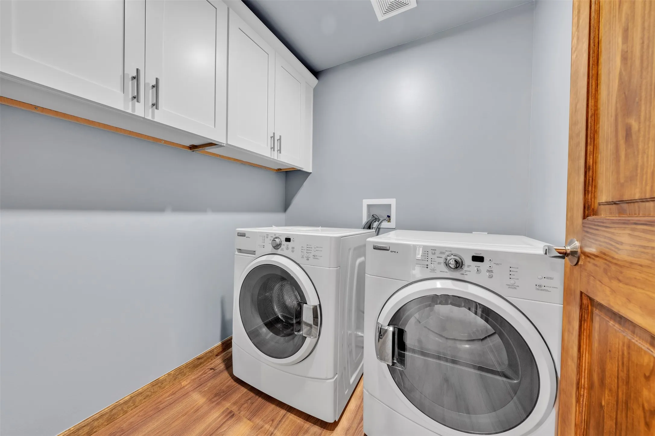 Washer and dryer convey with property.