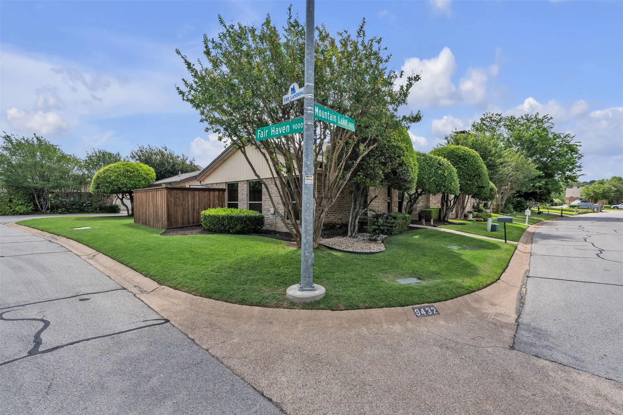 Corner lot. Rear parking and garage entry. Side patio.