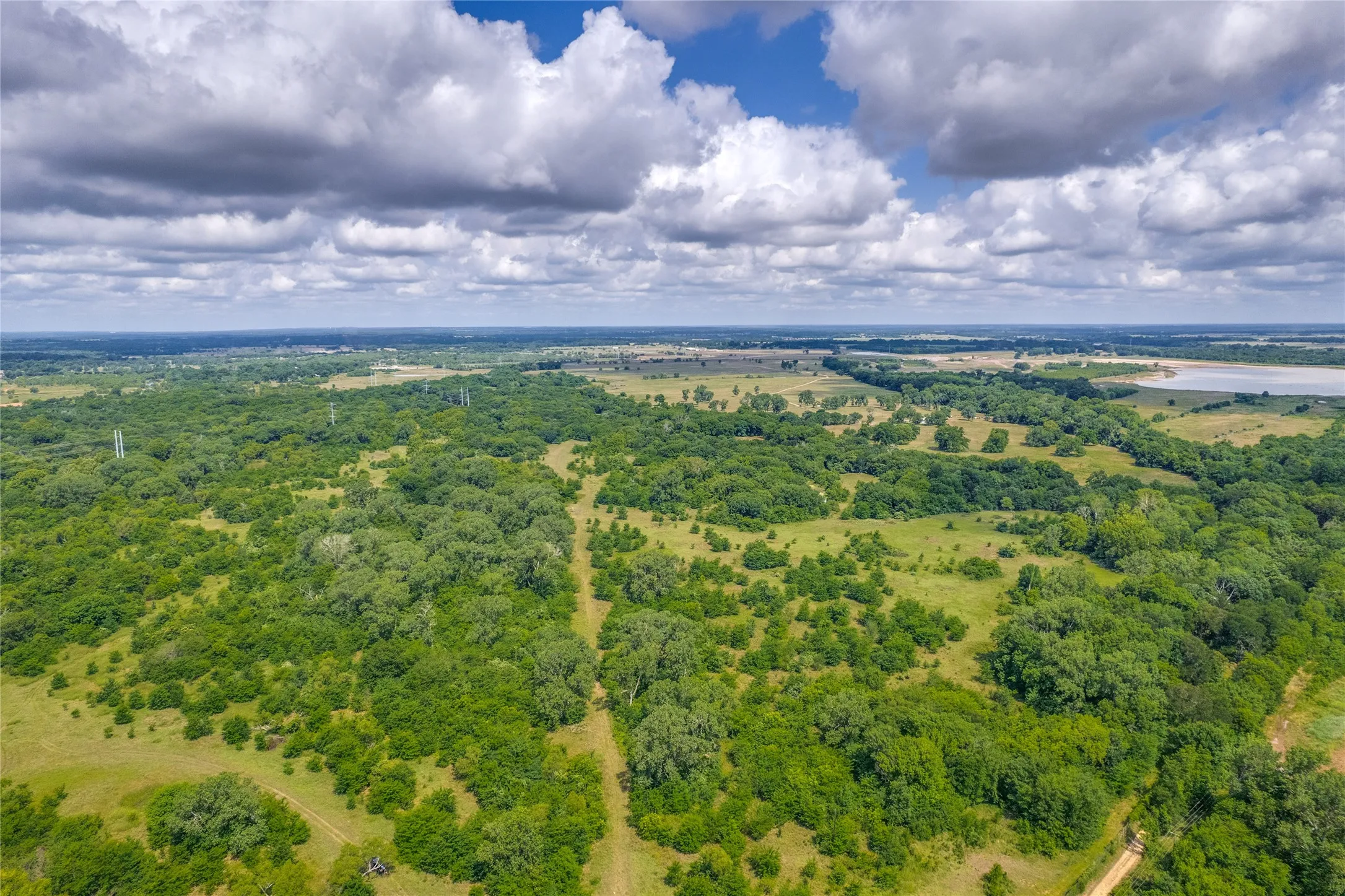 Aerial view from East property line looking West. Notice the Red River in distance.