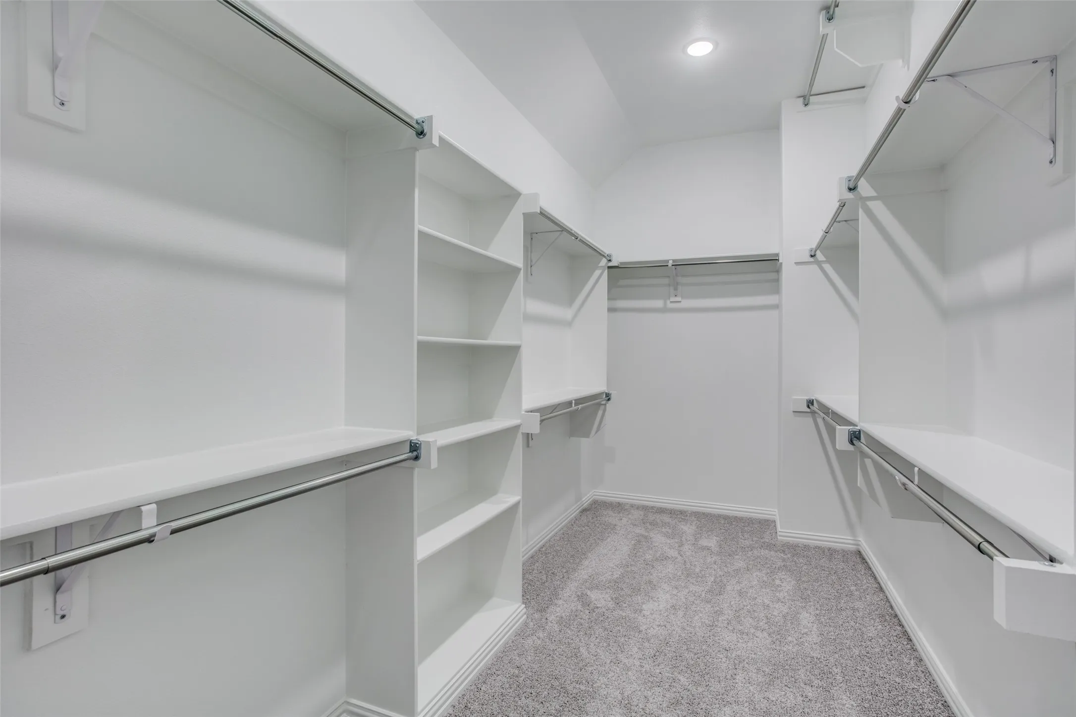 Primary bedroom features a super, duper oversized closet.