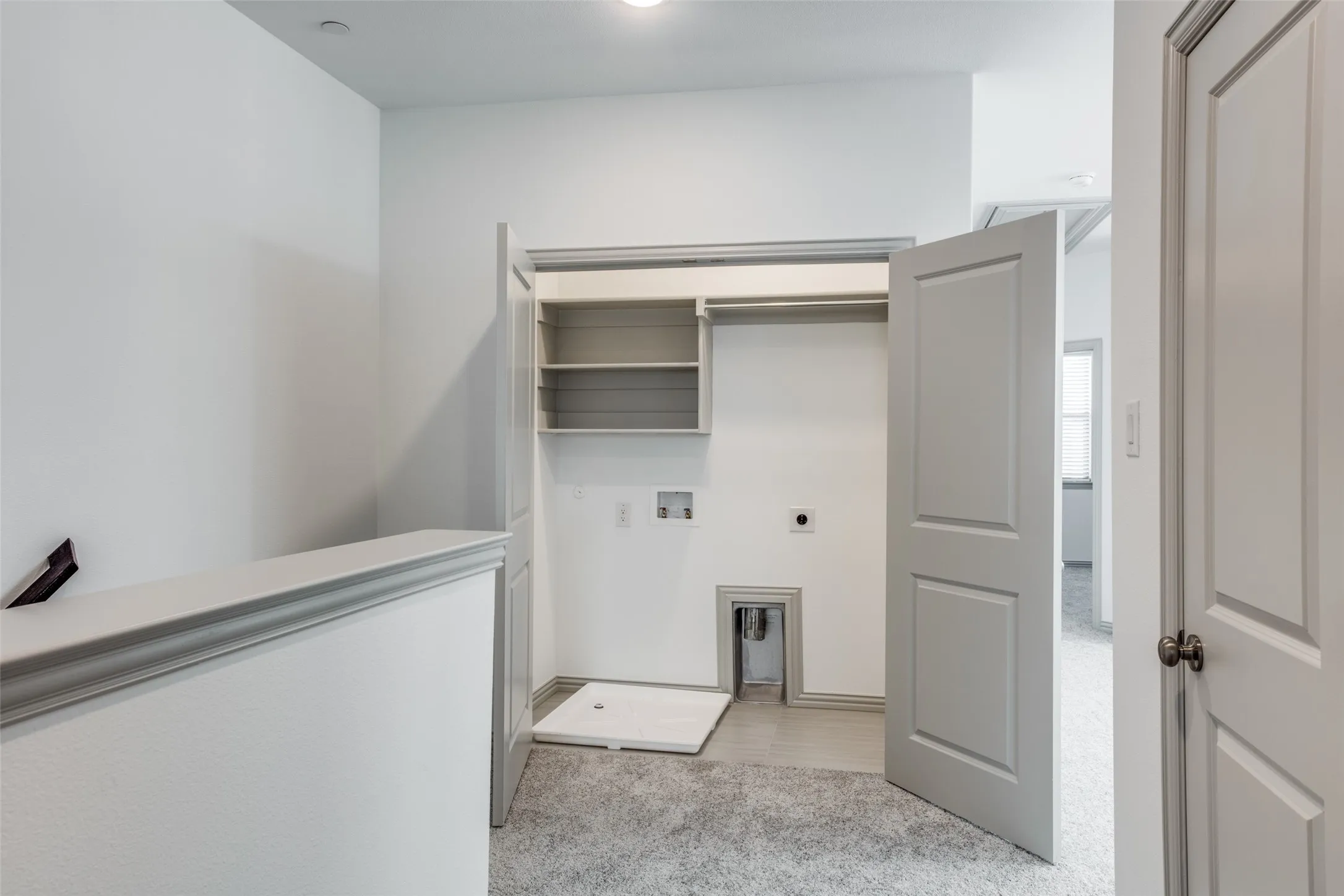 Full size washer & dryer area on level 2.